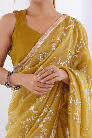 Dazzling Mustard Yellow Organza Saree Accented with Sequin, Bead & Stone Work and Delicate Lace Detailing
