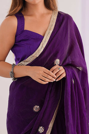 Elegant Deep Purple Organza Saree with Delicate Floral Embellishments and Lace Border