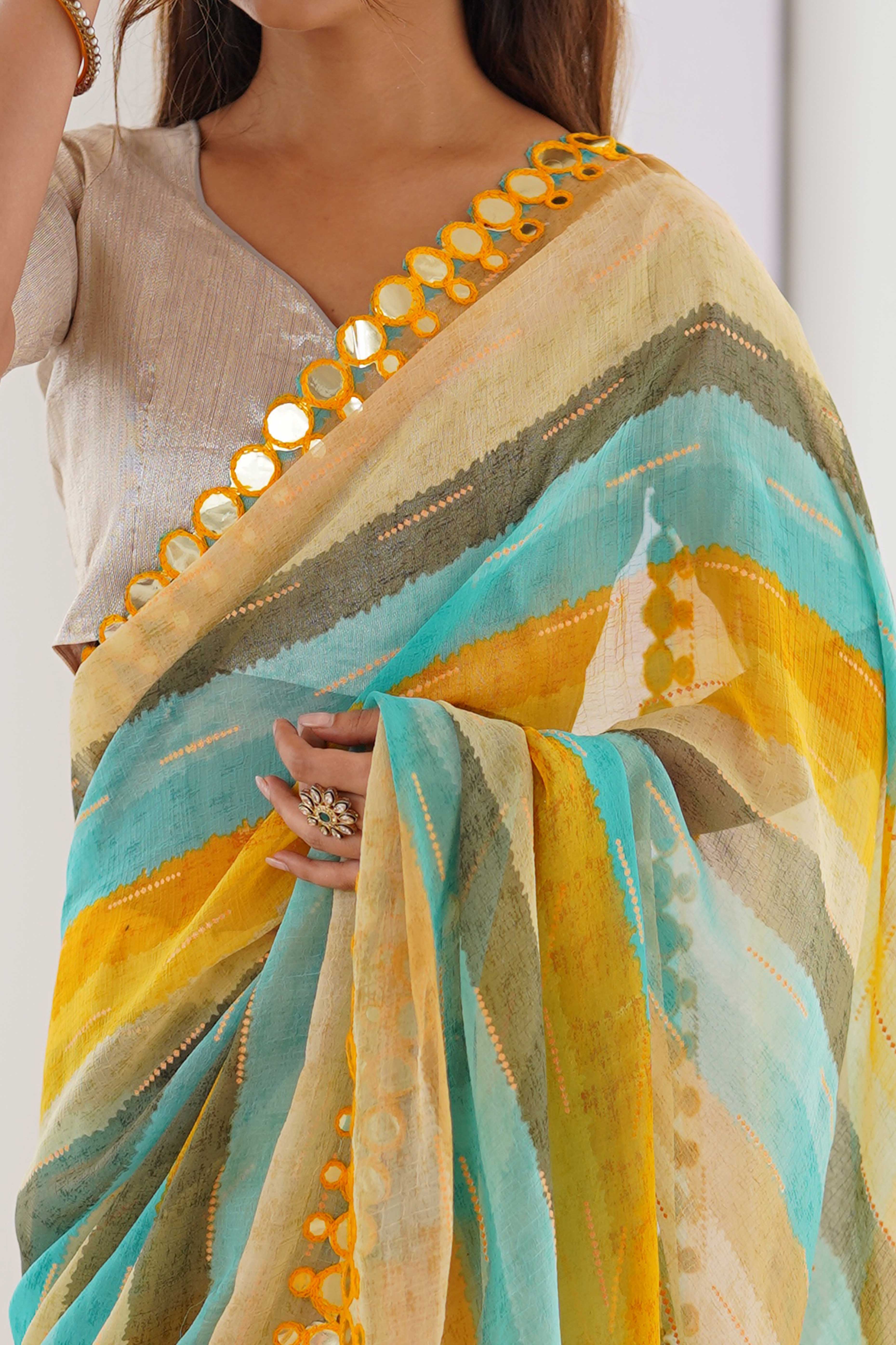 Soft Chiffon Yellow Saree Featuring Classic Leheriya and Mirror Work Edges
