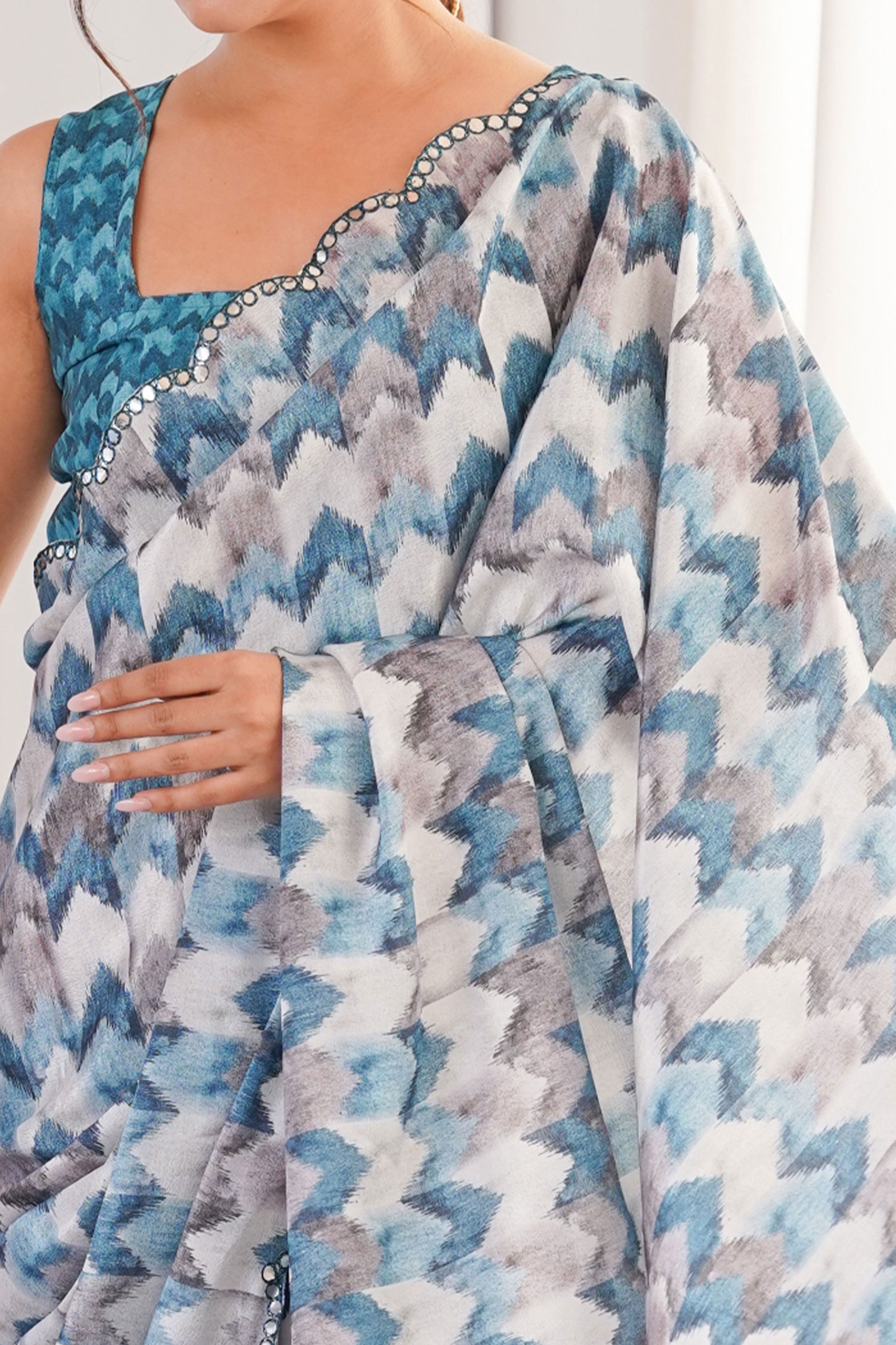 Elegant White Floral Digital Printed Chinon Saree Accented With Intricate Embroidered Border