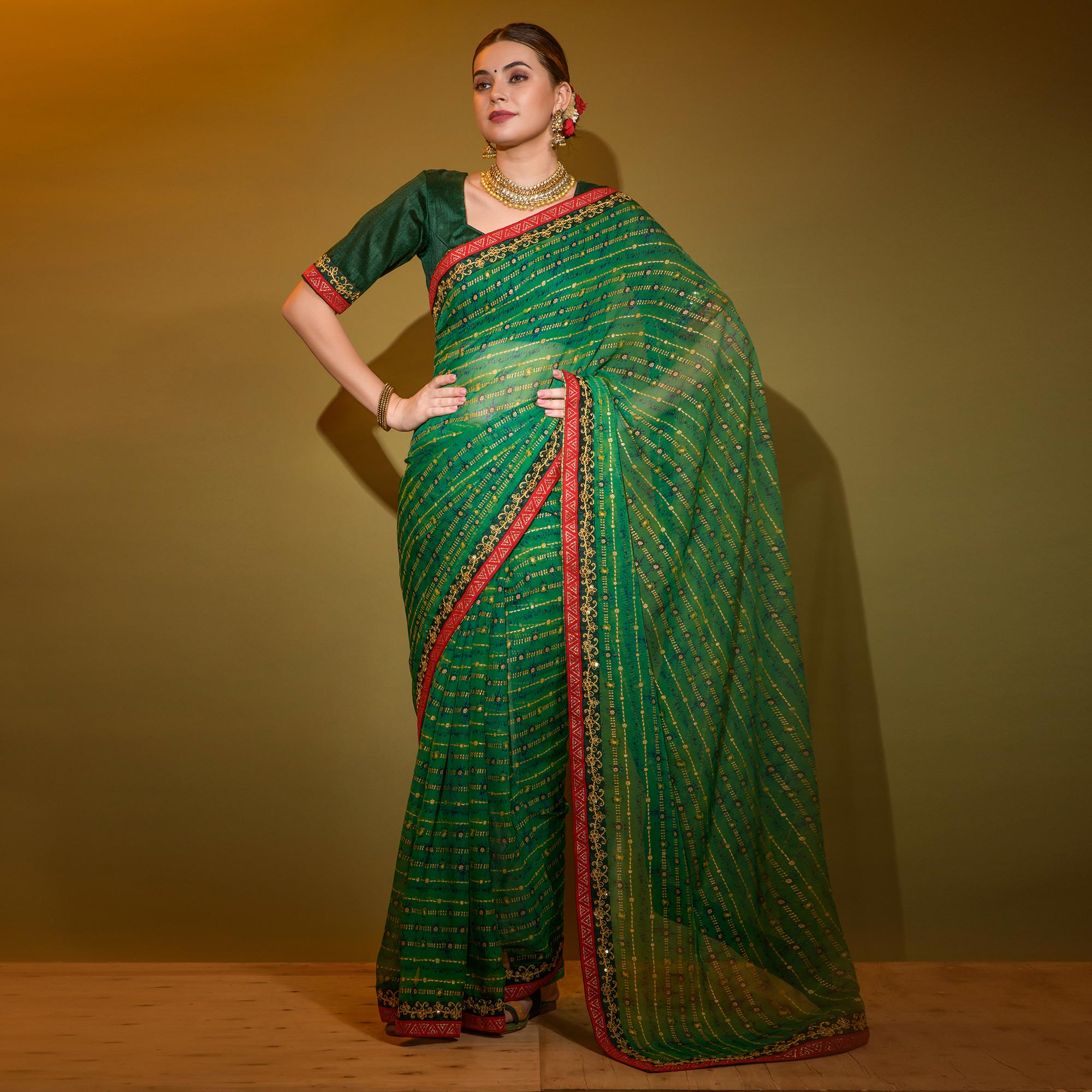 Green Foil Printed Georgette Saree With Embroidered Border