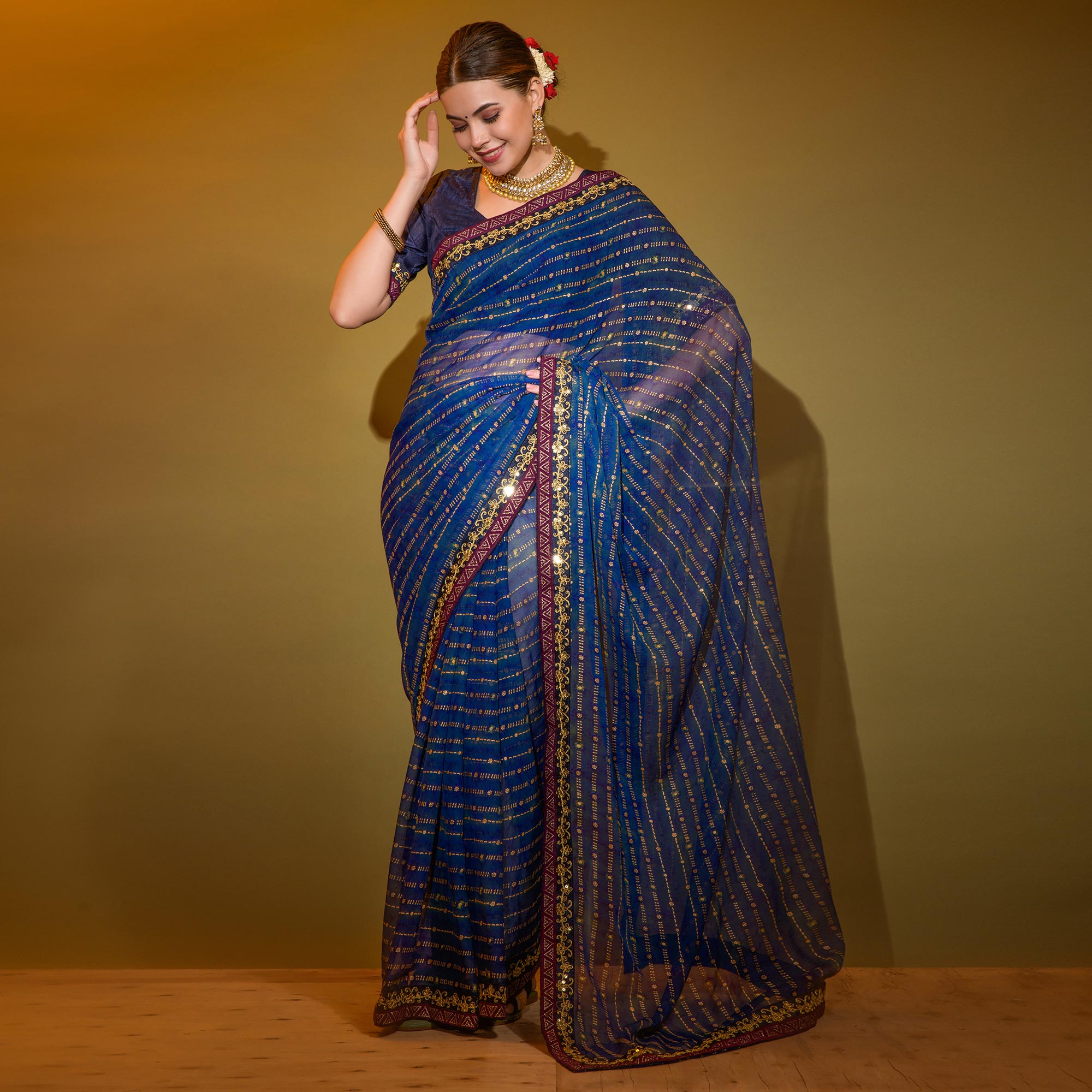 Blue Foil Printed Georgette Saree With Embroidered Border