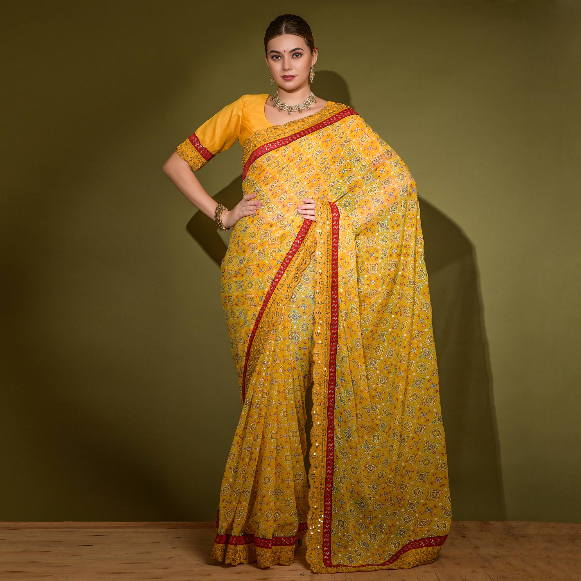 Yellow Patola Foil Printed Georgette Saree with Embroidered Border