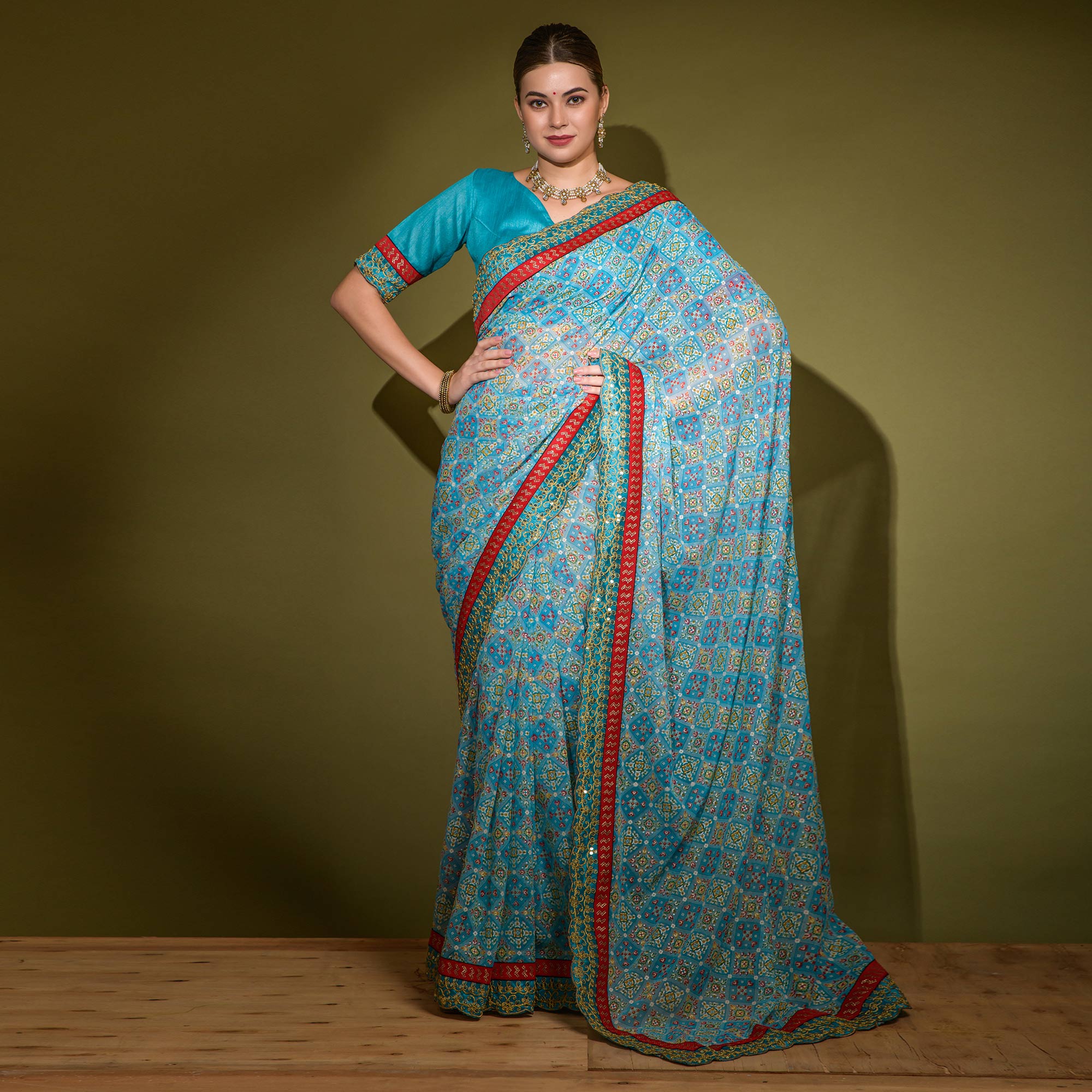Blue Patola Foil Printed Georgette Saree with Embroidered Border