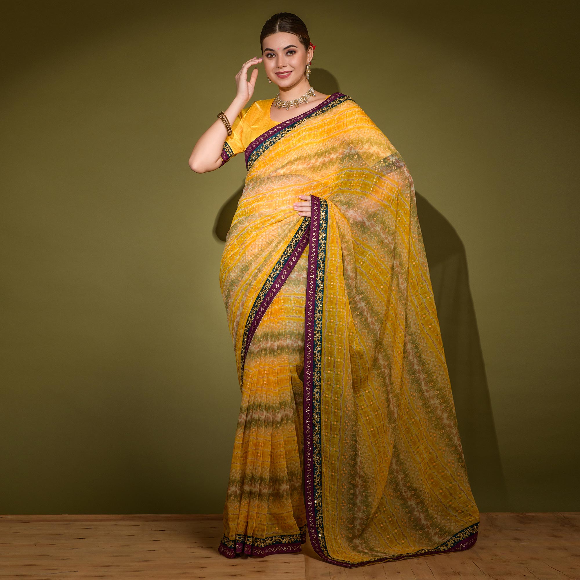 Yellow Leheriya Printed Georgette Saree With Embroidered Border