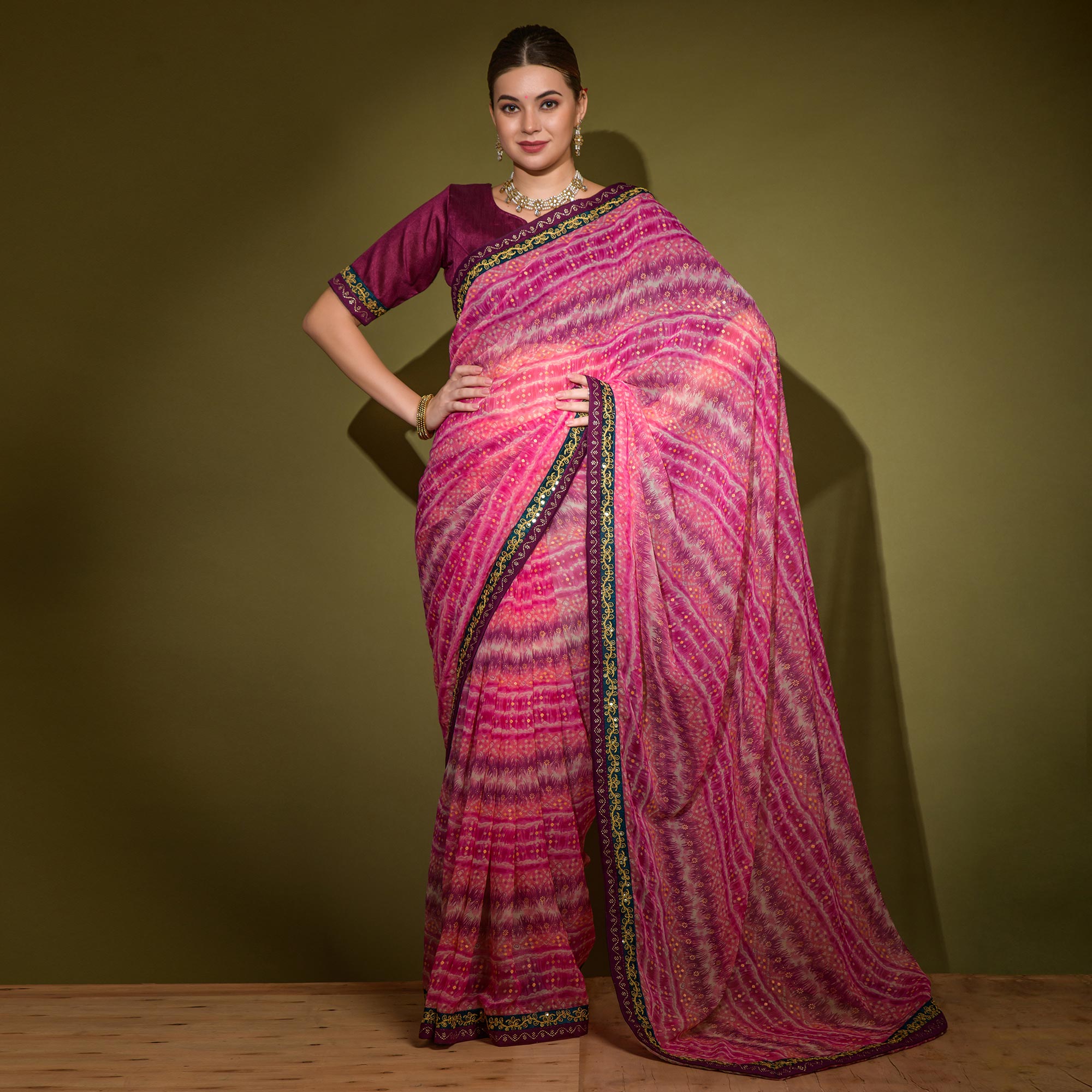 Pink Leheriya Printed Georgette Saree With Embroidered Border