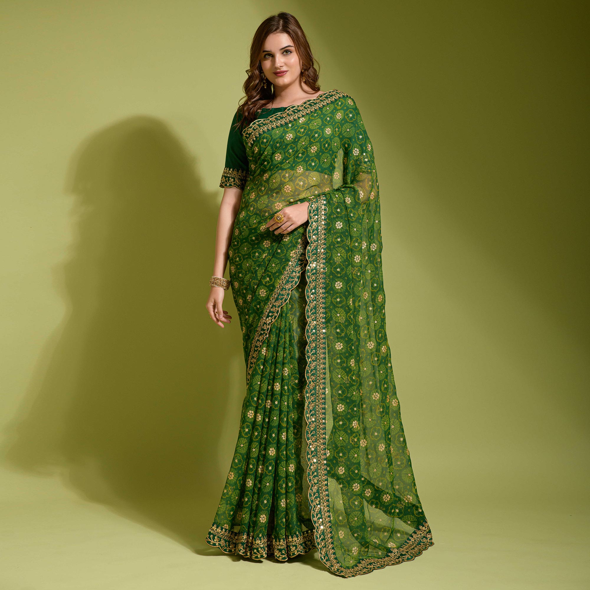 Green Bandhani Foil Printed Georgette Saree With Embroidered Border