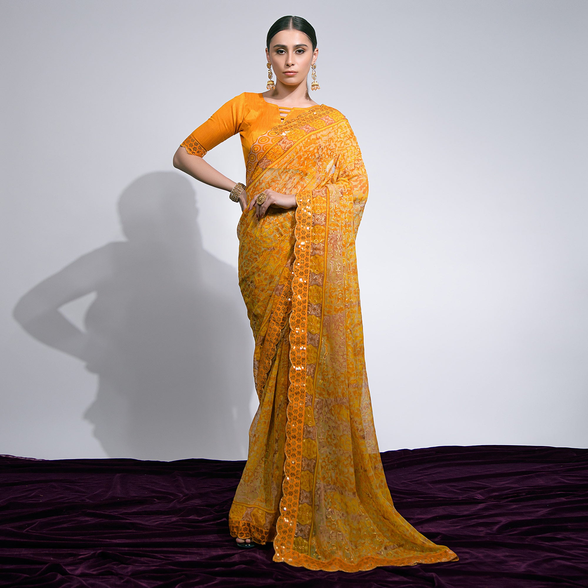 Yellow Foil Printed Chiffon Saree With Embroidered Border