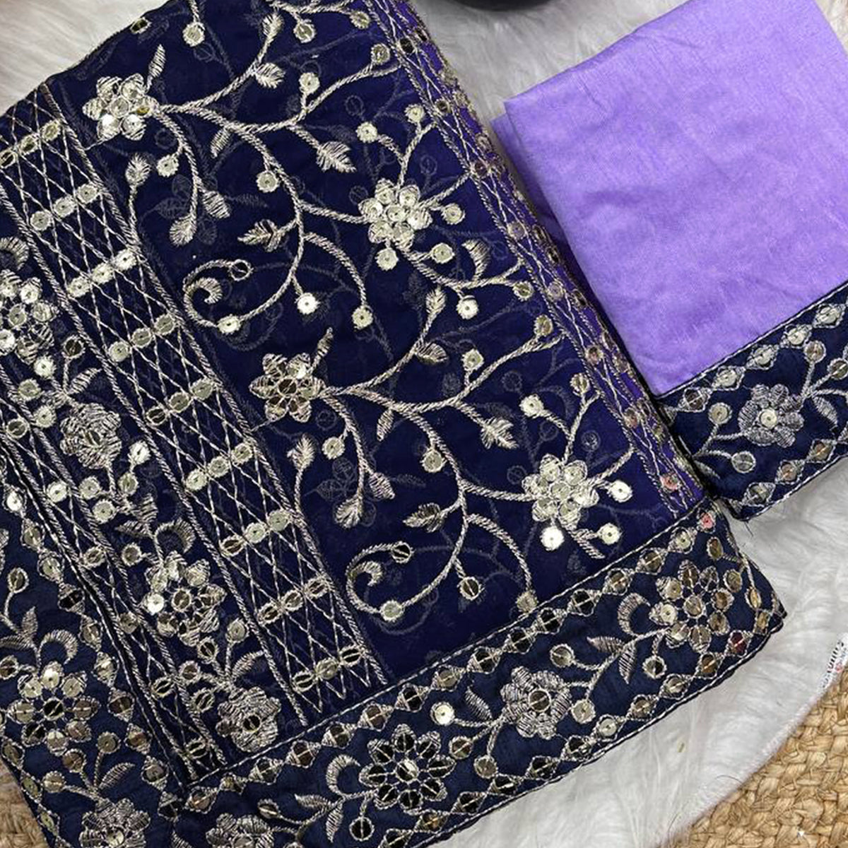 Beautiful Lavender Partywear Saree Crafted in Georgette with Sequins and Thread Work