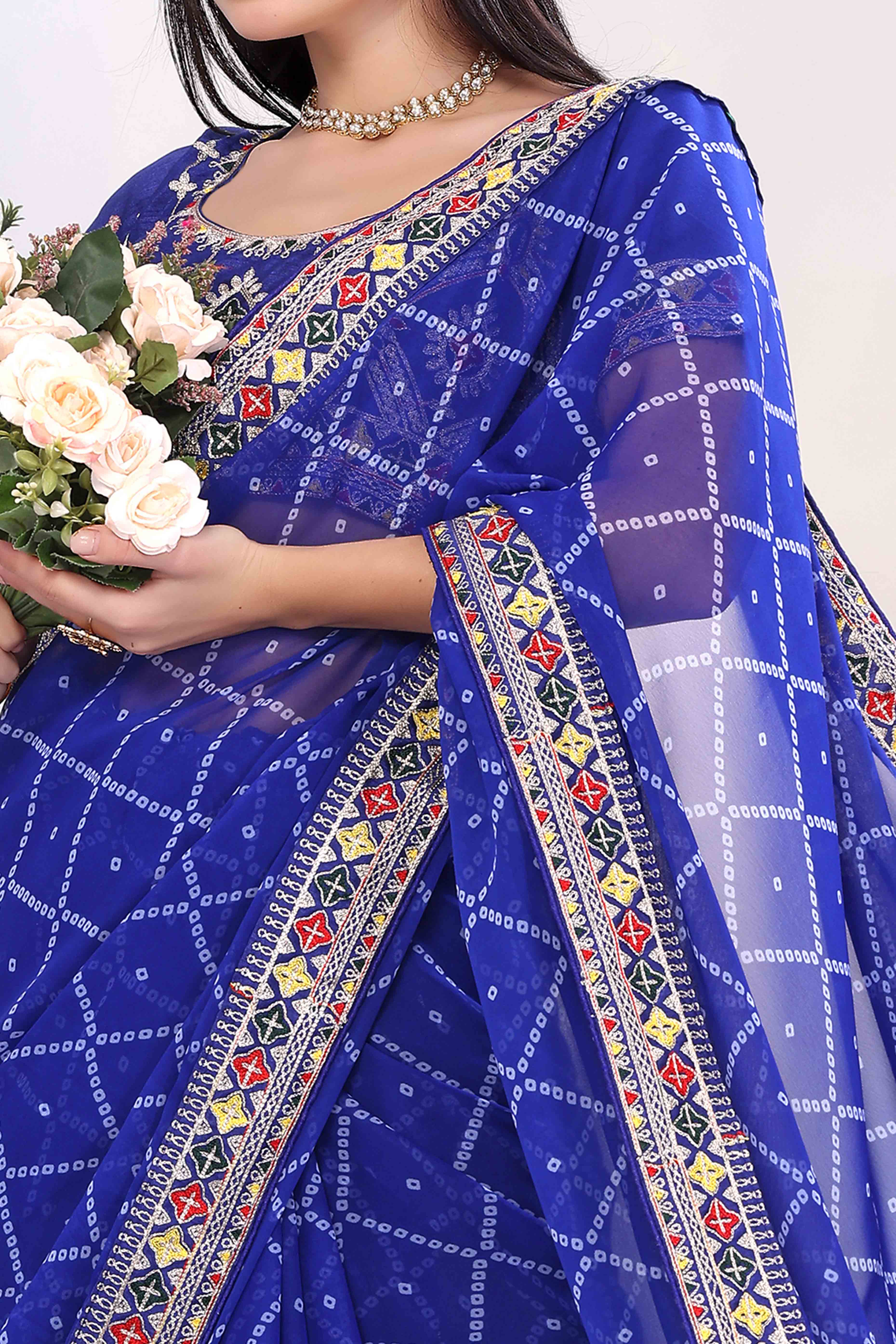 Blue Bandhani Printed Georgette Saree Framed With Elegant Embroidered Border