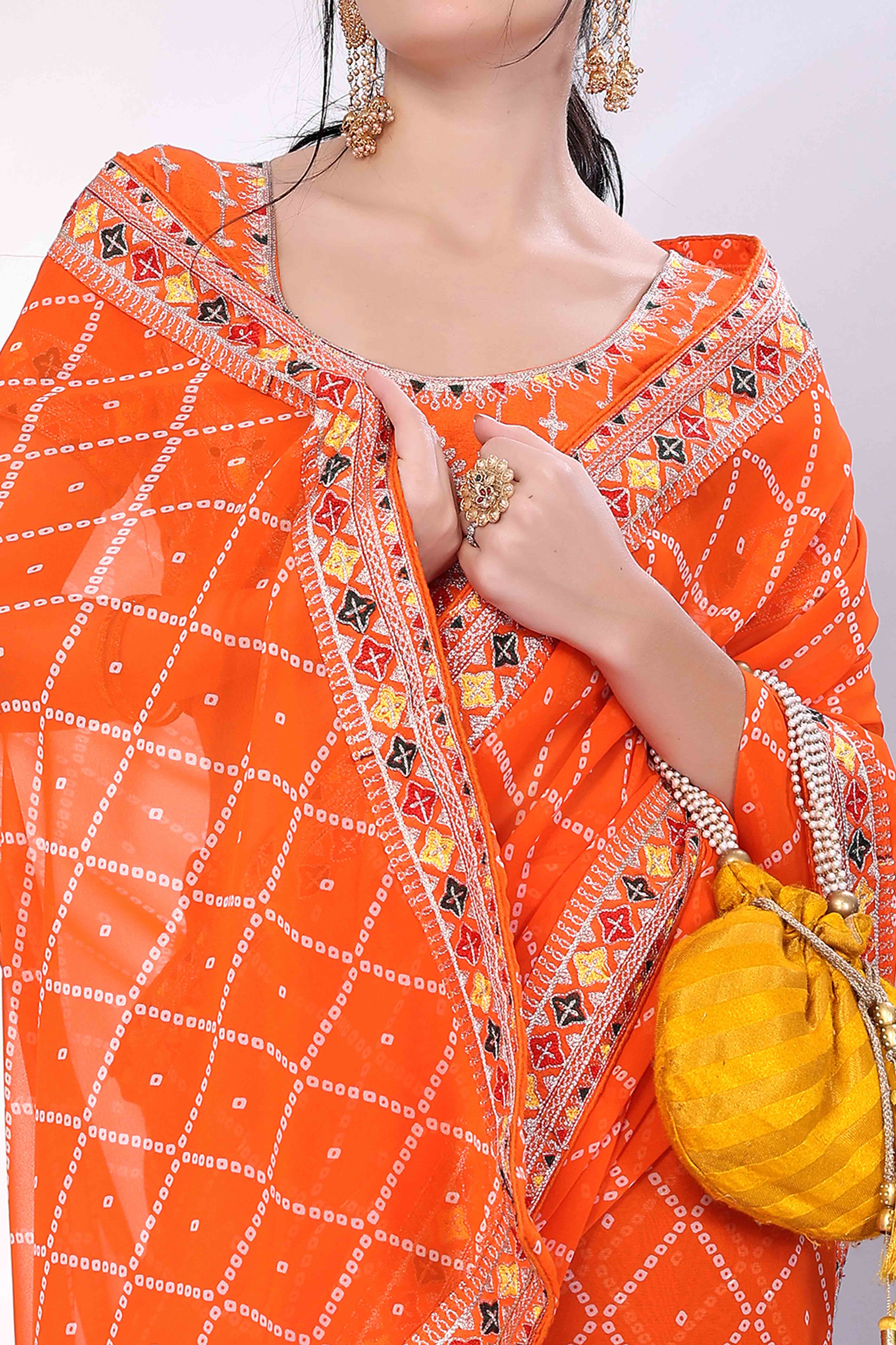 Orange Bandhani Printed Georgette Saree Framed With Elegant Embroidered Border