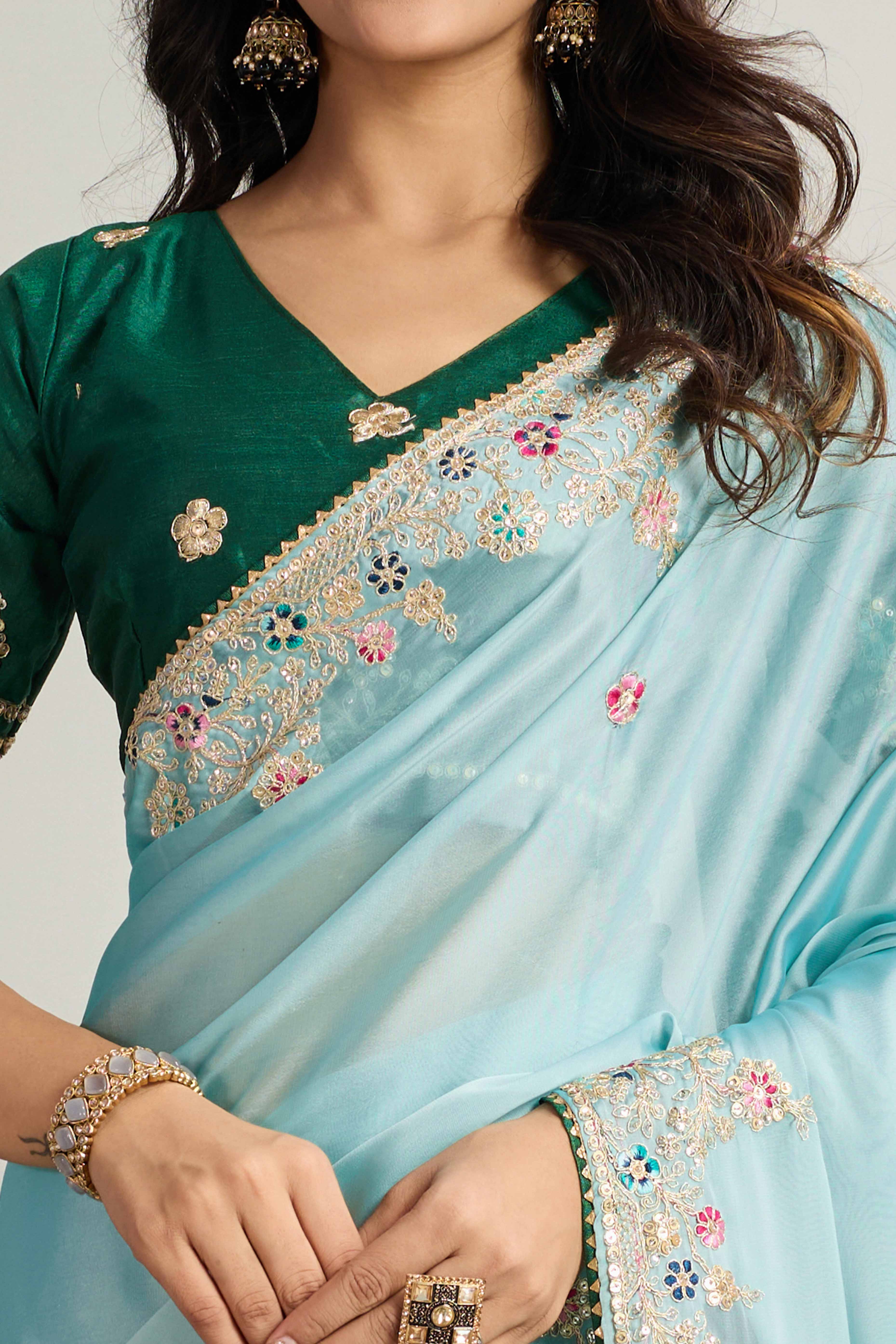 Aqua Blue Star Georgette Party Saree with Sequins and Floral Embroidery