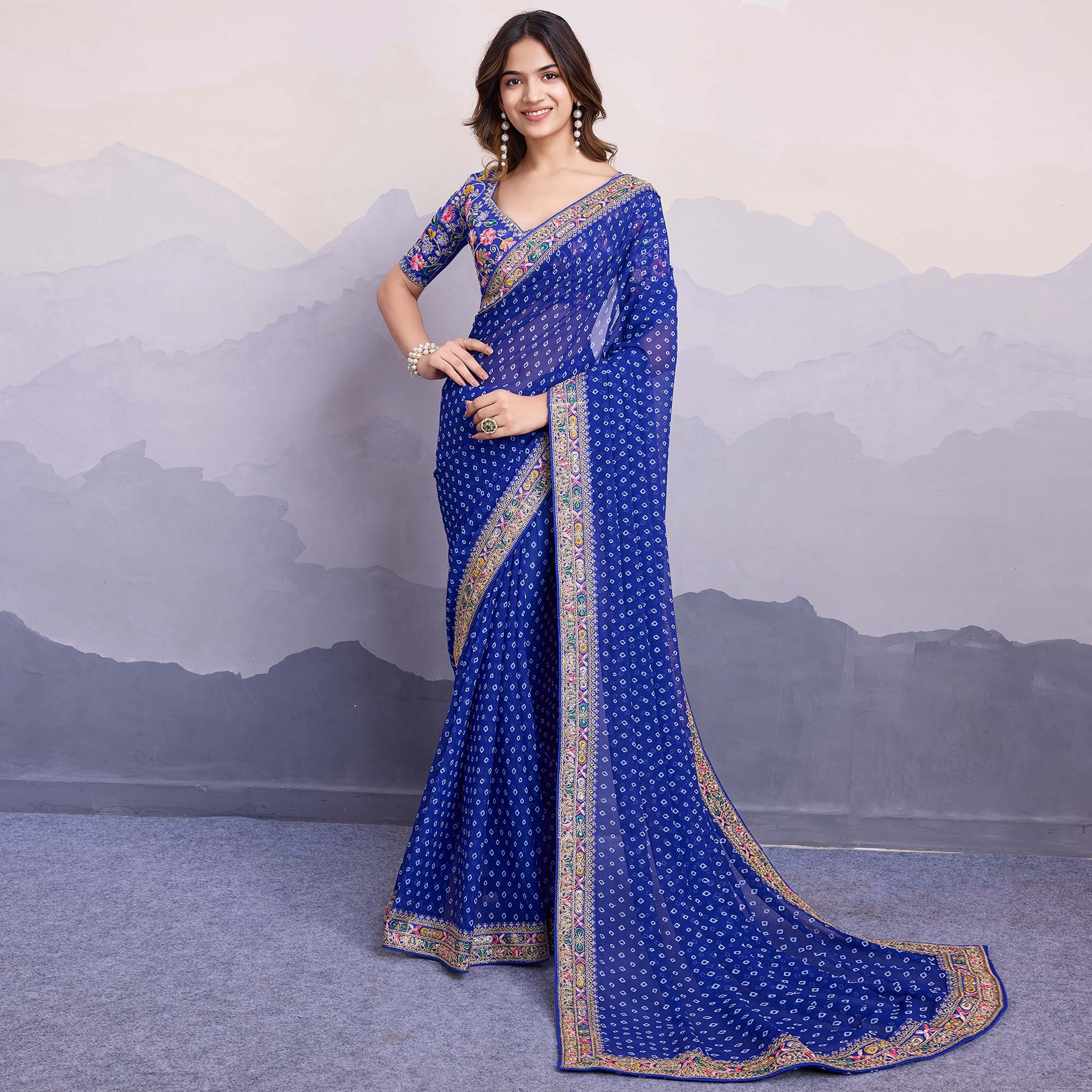 Blue Bandhani Printed Georgette Saree With Embroidered Lace Border