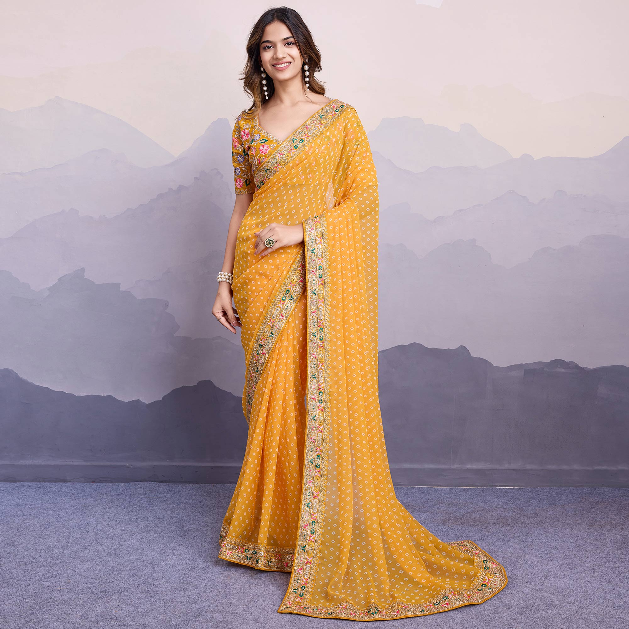 Yellow Bandhani Printed Georgette Saree With Embroidered Lace Border