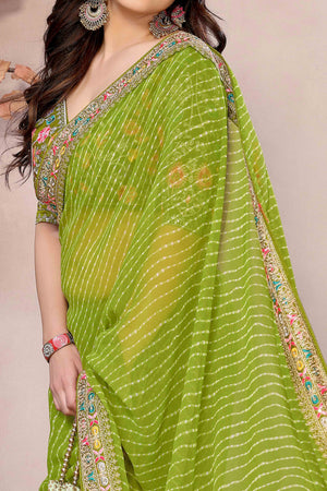 Green Striped Printed Georgette Saree With Glittering Sequin Cording Embroidered Border