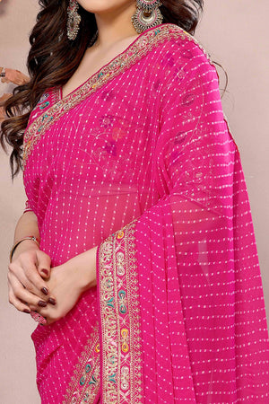 Pink Striped Printed Georgette Saree With Glittering Sequin Cording Embroidered Border