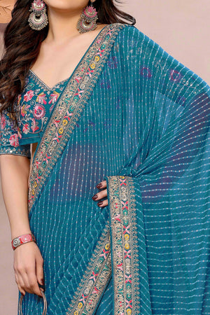 Blue Striped Printed Georgette Saree With Glittering Sequin Cording Embroidered Border