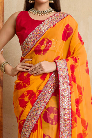 Bright Orange Georgette Saree with Contemporary Tie-Dye Patterns and Classic Lace Work Finish