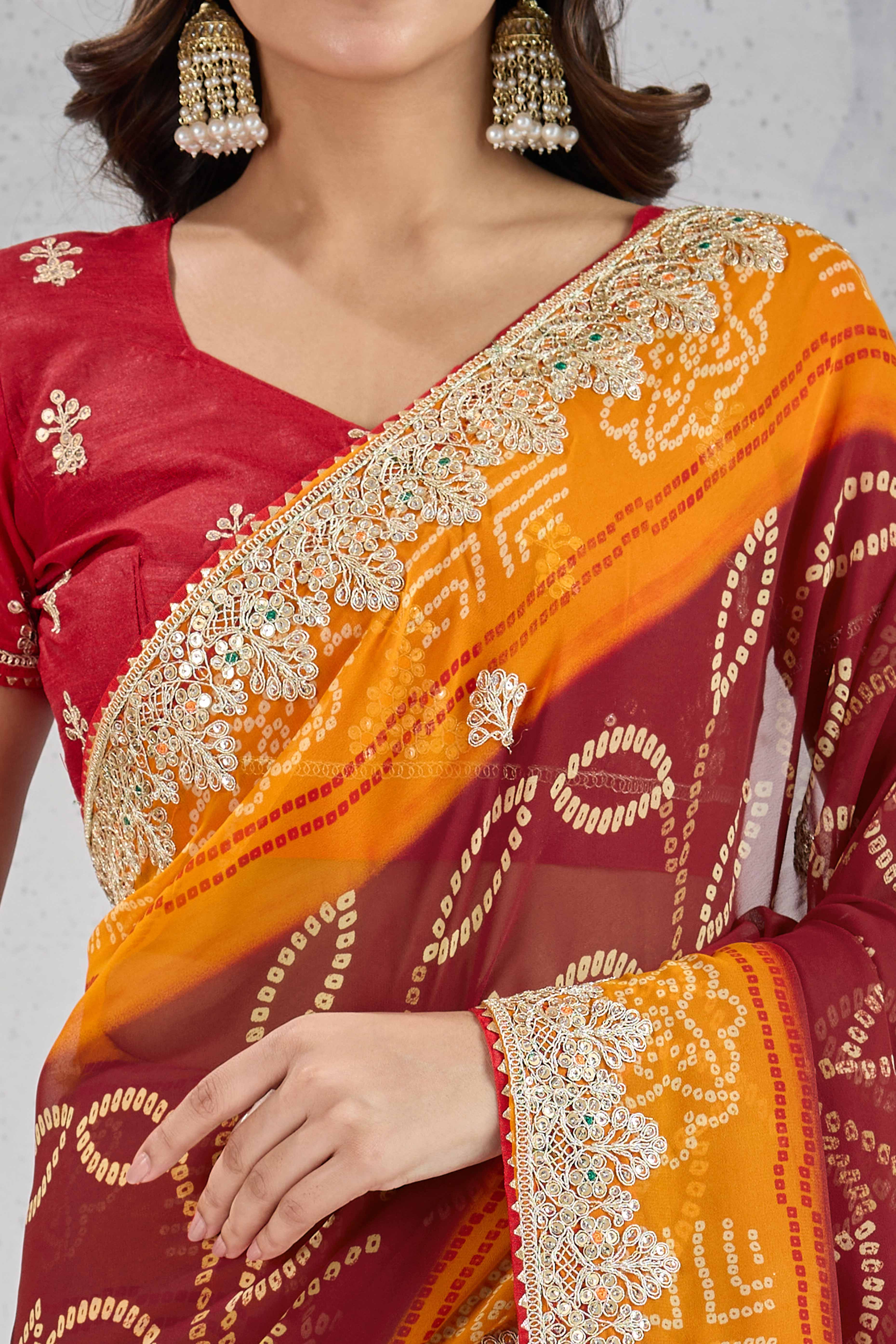 Traditional Bandhani Maroon Georgette Saree with Fine Embroidery