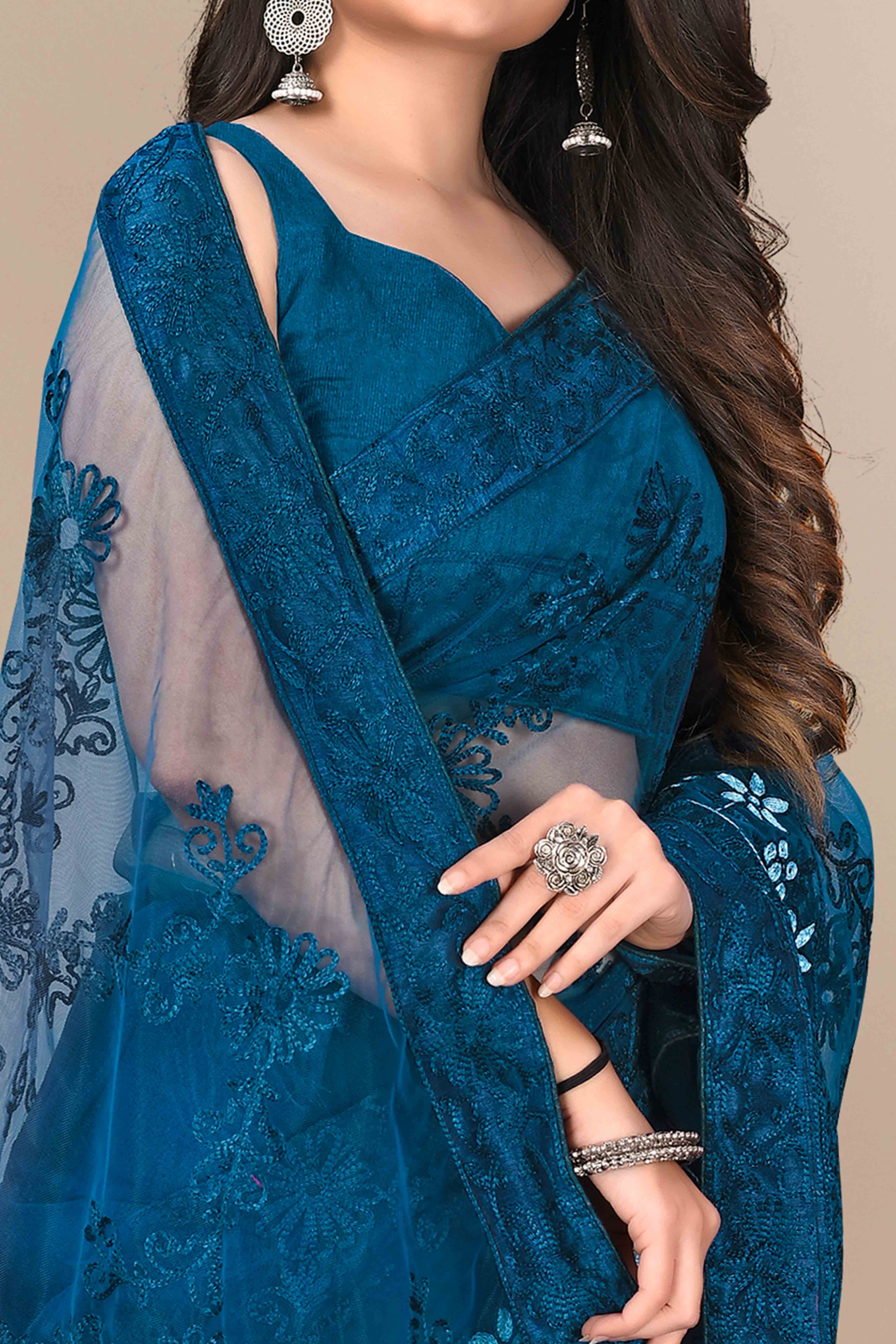 Teal Party Wear Net Saree Featuring Rich Floral Embroidery
