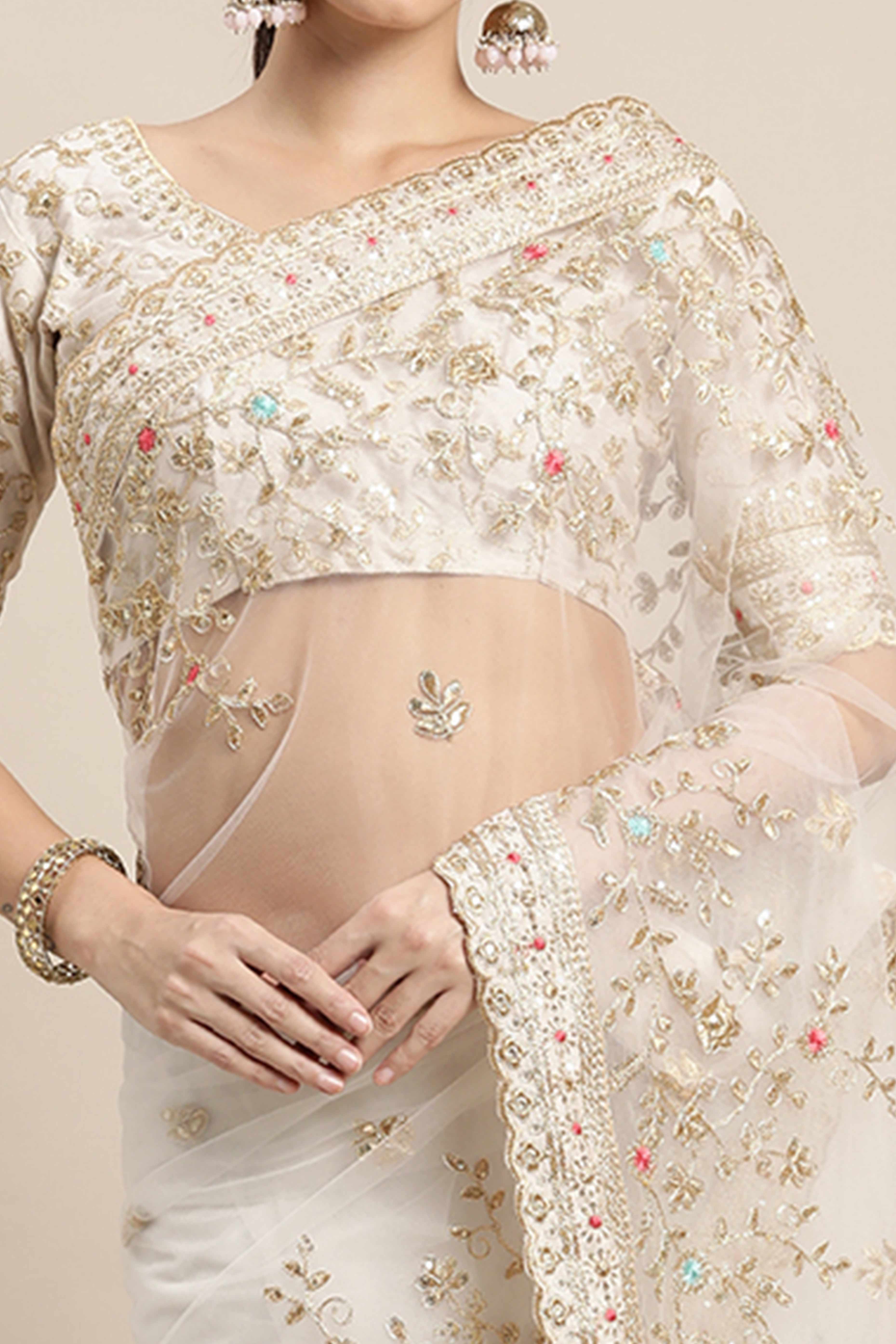 Cream Soft Net Saree With Delicate Floral Embroidery & Shimmering Sequins Work