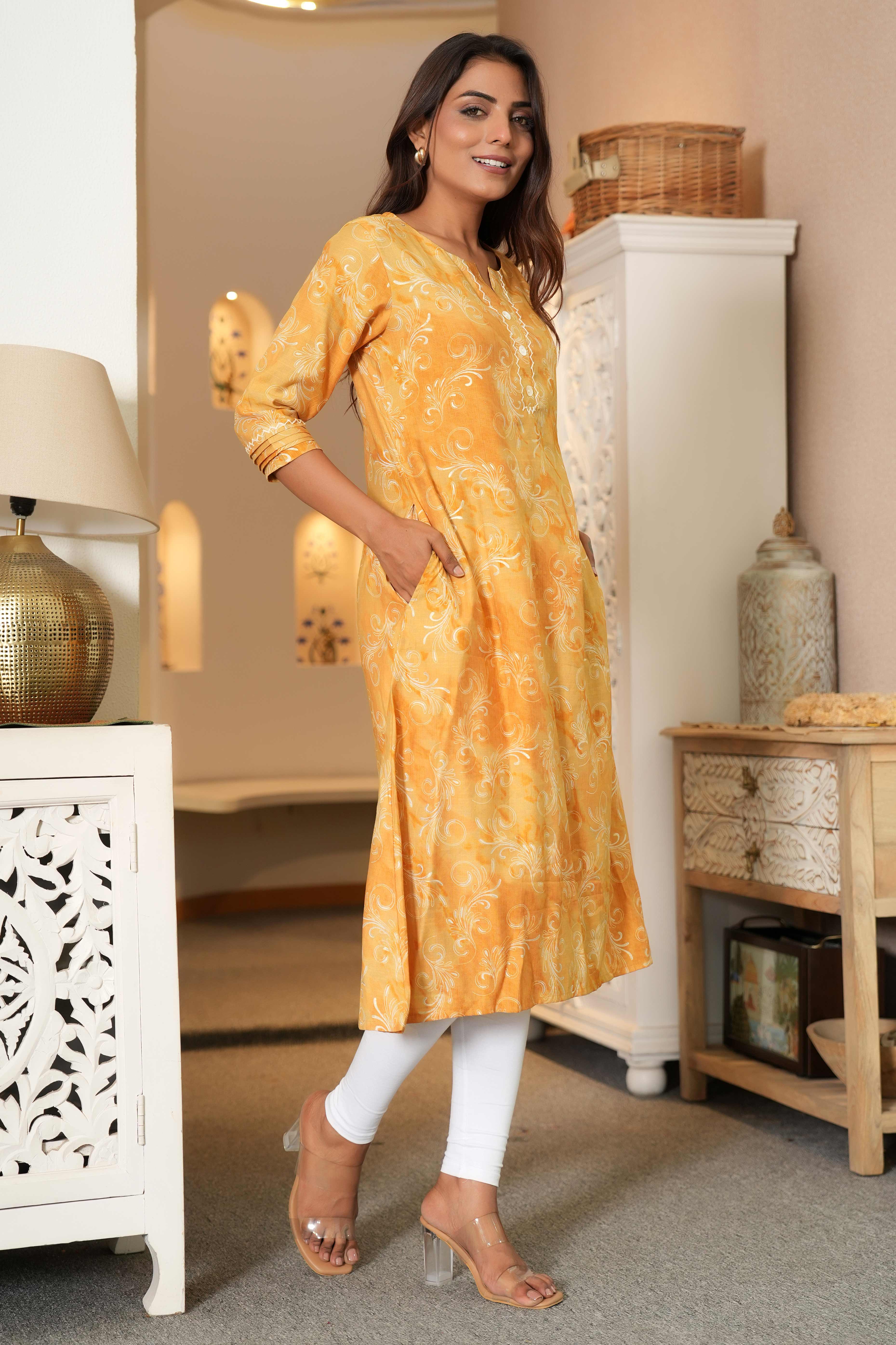Floral Printed Mustard Capsule Rayon Kurti in Straight Fit