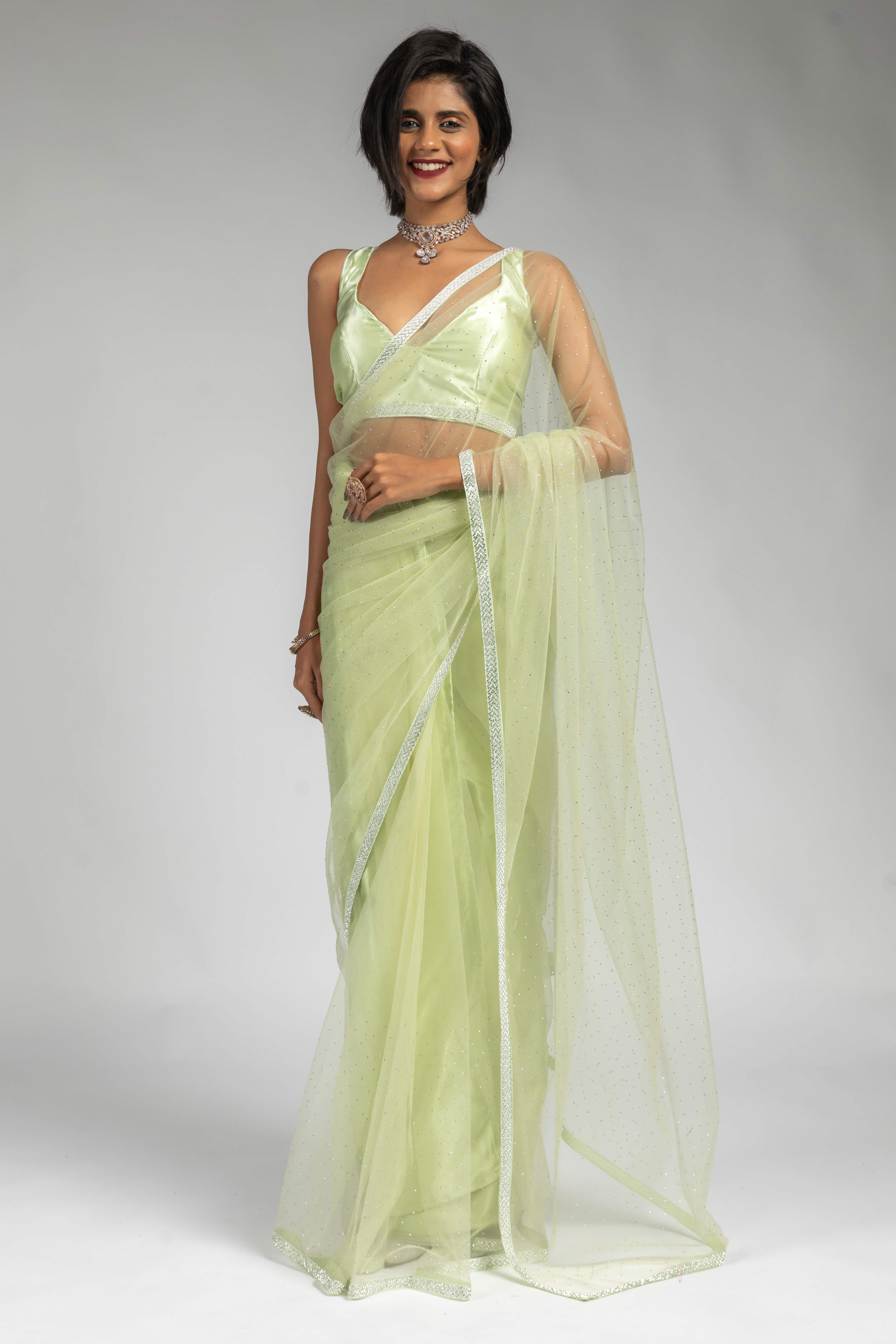 Tea Green Intricate Zarkan Detailing Soft Net Ready To Wear Saree