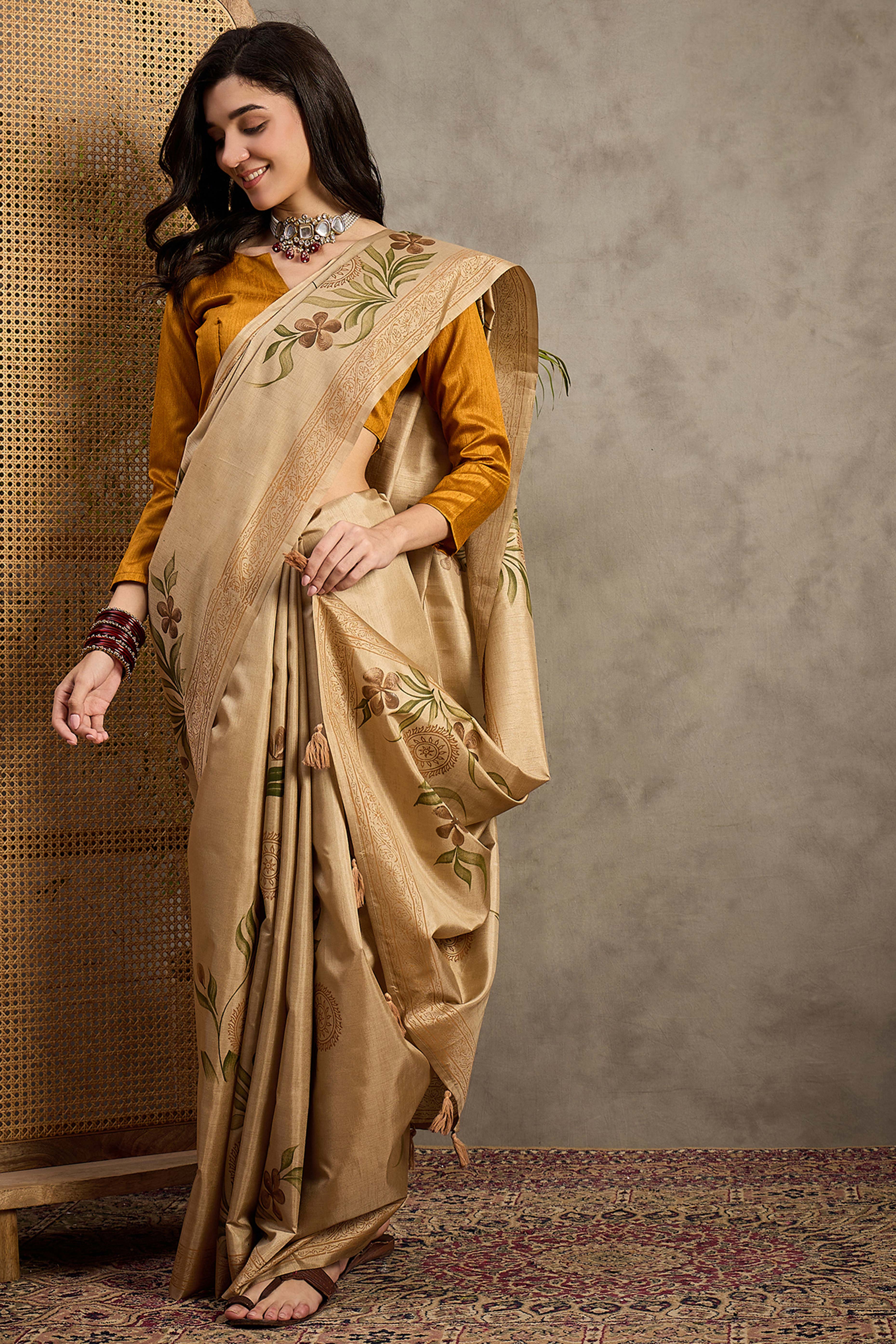 Elegant Beige Floral Print Kozi Cotton Silk Saree Accented With Graceful Tassel Pallu