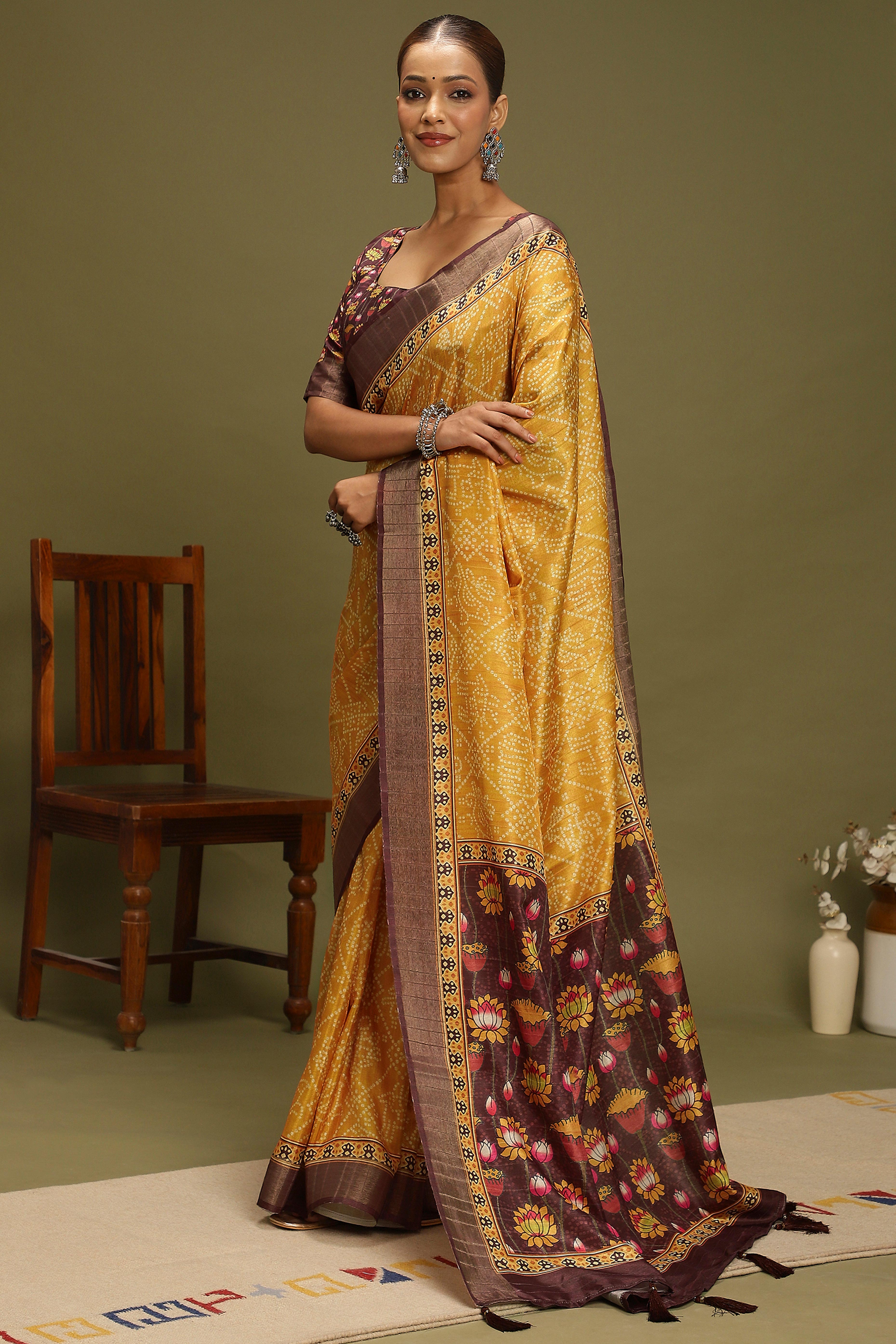 Yellow Silk Blend Saree Decorated with Vibrant Bandhani Prints and Festive Detailing