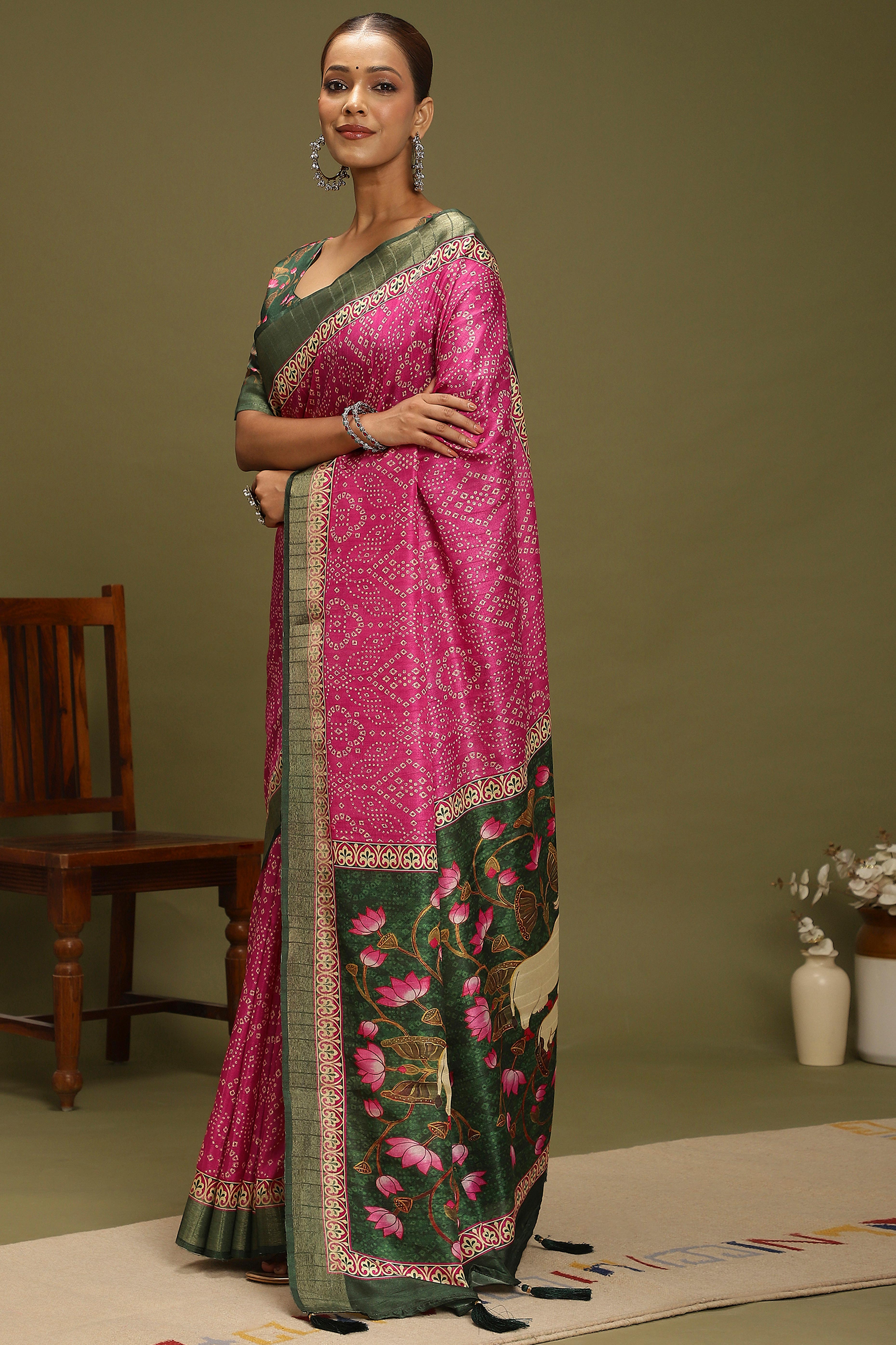 Pink Silk Blend Saree Decorated with Vibrant Bandhani Prints and Festive Detailing