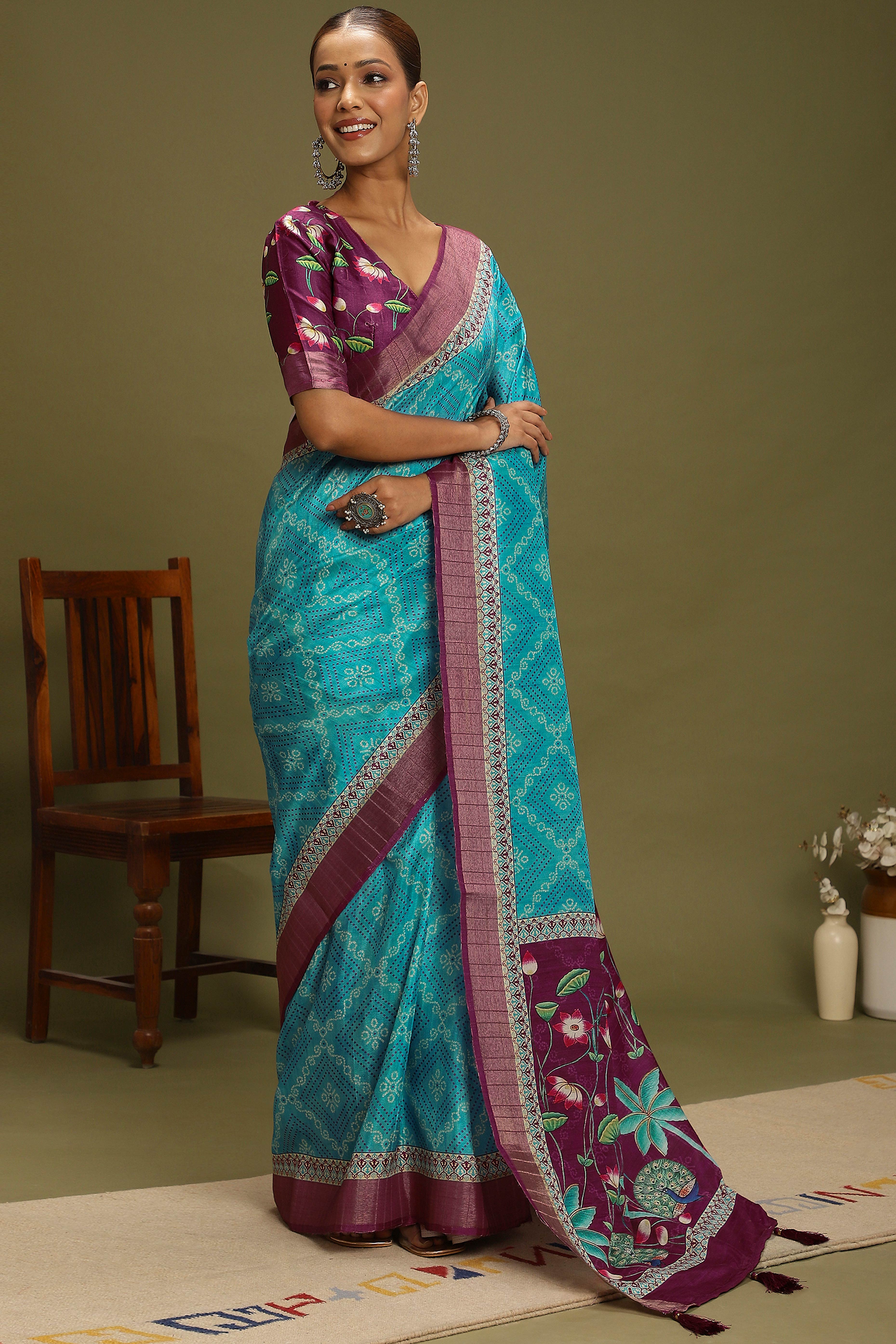 Turquoise Silk Blend Saree Decorated with Vibrant Bandhani Prints and Festive Detailing