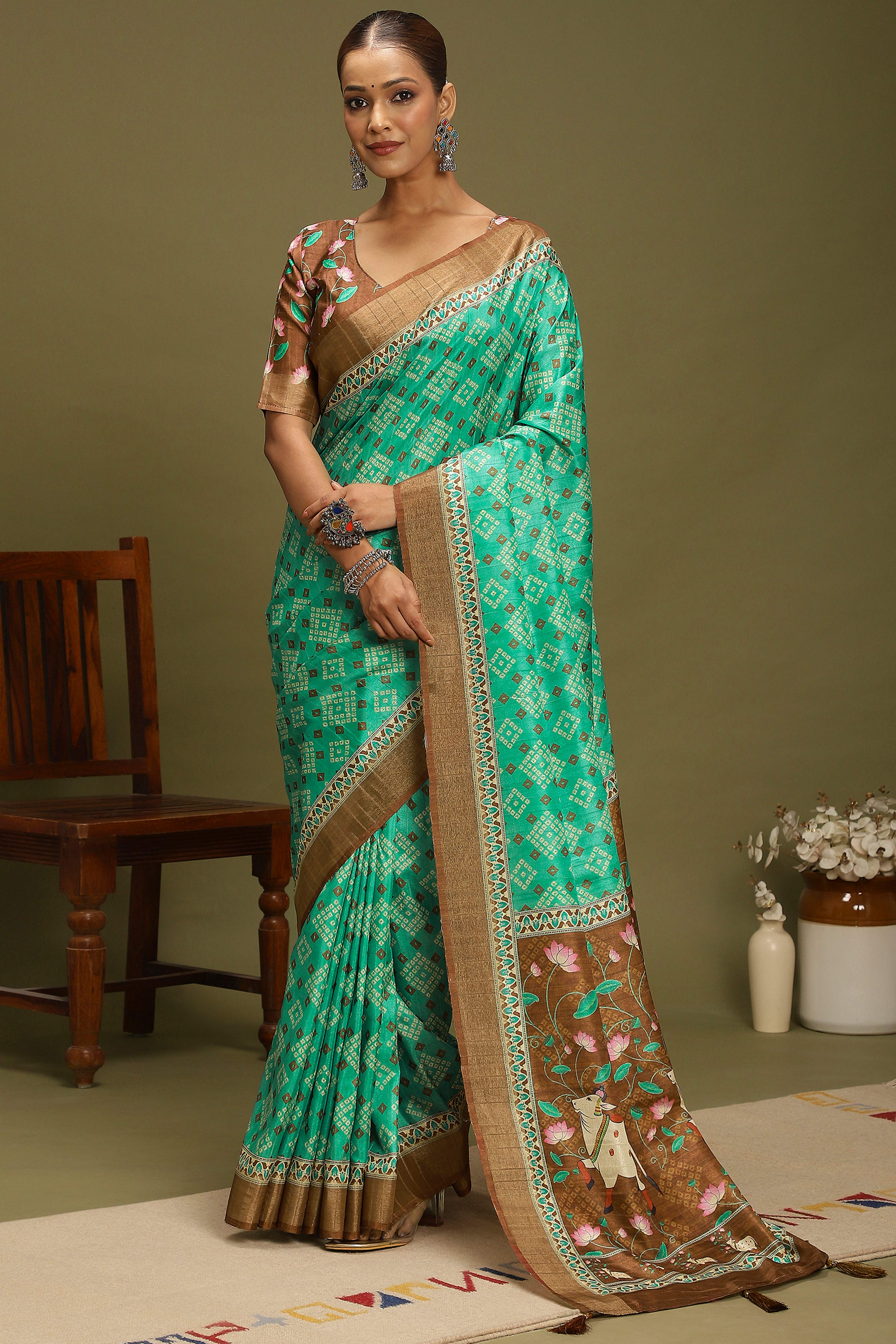 Rama Green Silk Blend Saree Decorated with Vibrant Bandhani Prints and Festive Detailing