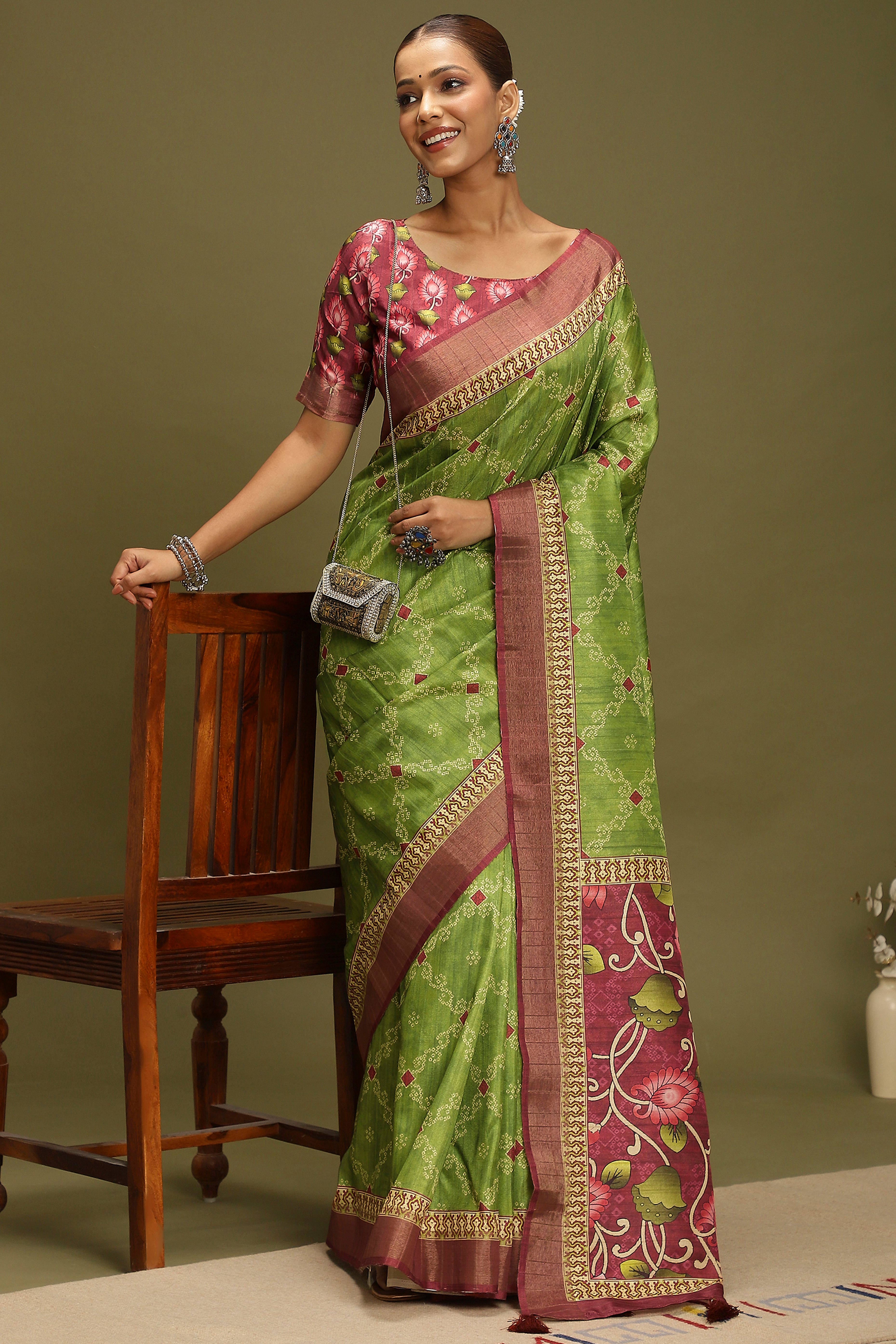Green Silk Blend Saree Decorated with Vibrant Bandhani Prints and Festive Detailing