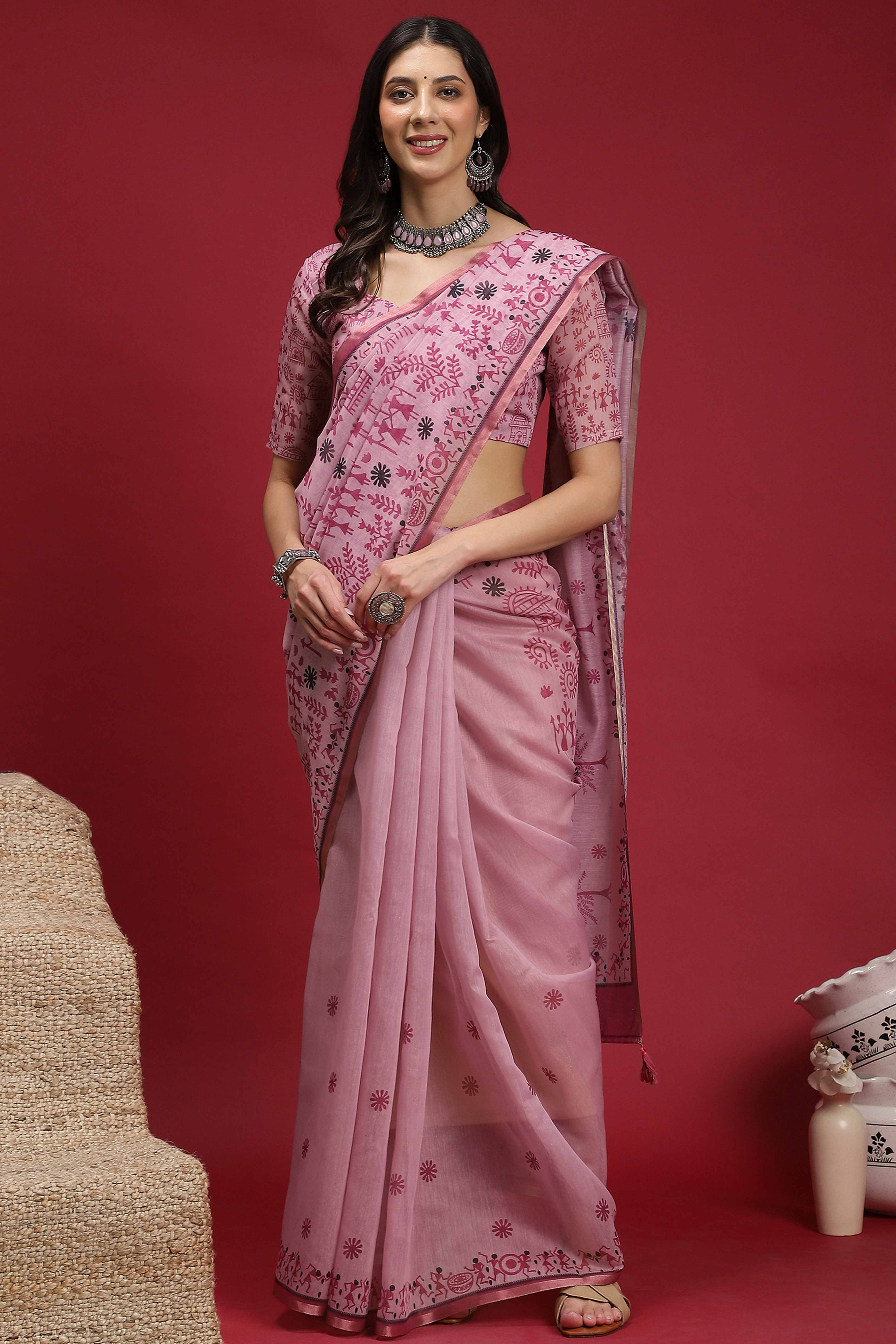 Pink Linen Cotton Saree Featuring Traditional Warli Prints & Tassel Pallu