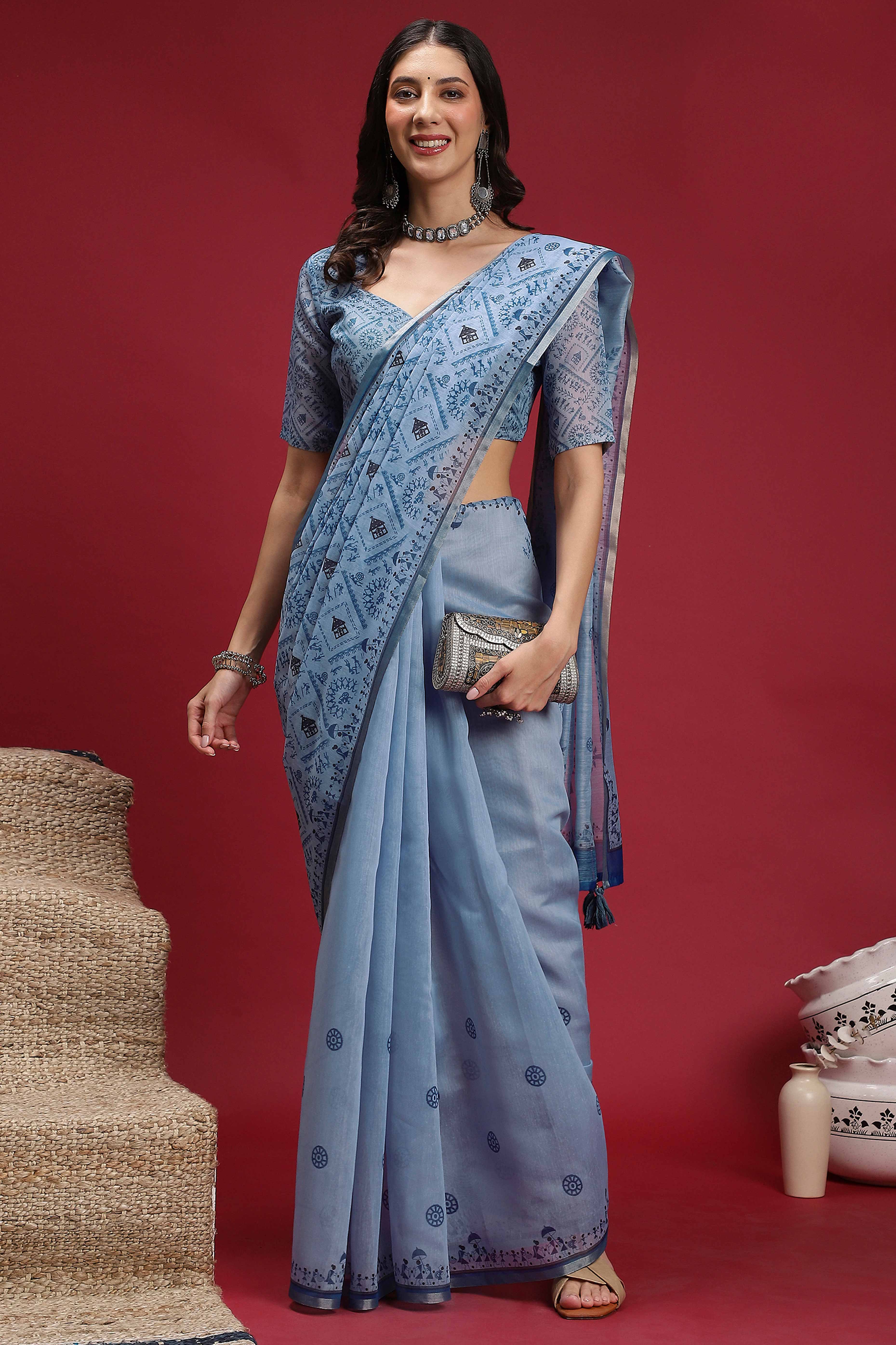 Light Blue Linen Cotton Saree Featuring Traditional Warli Prints & Tassel Pallu