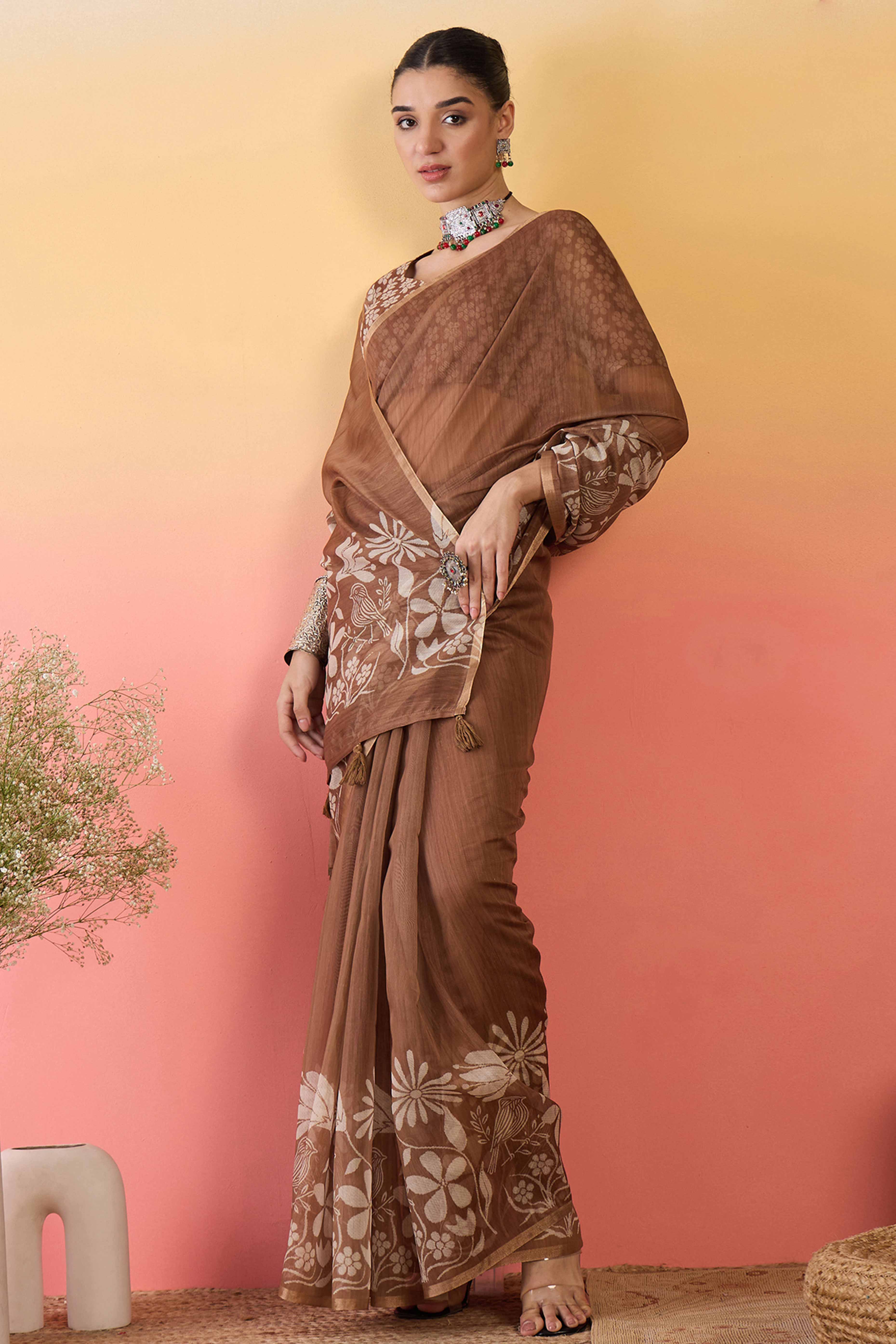Brown Linen Cotton Saree Featuring Elegant Floral & Bird Prints With Tassel Pallu