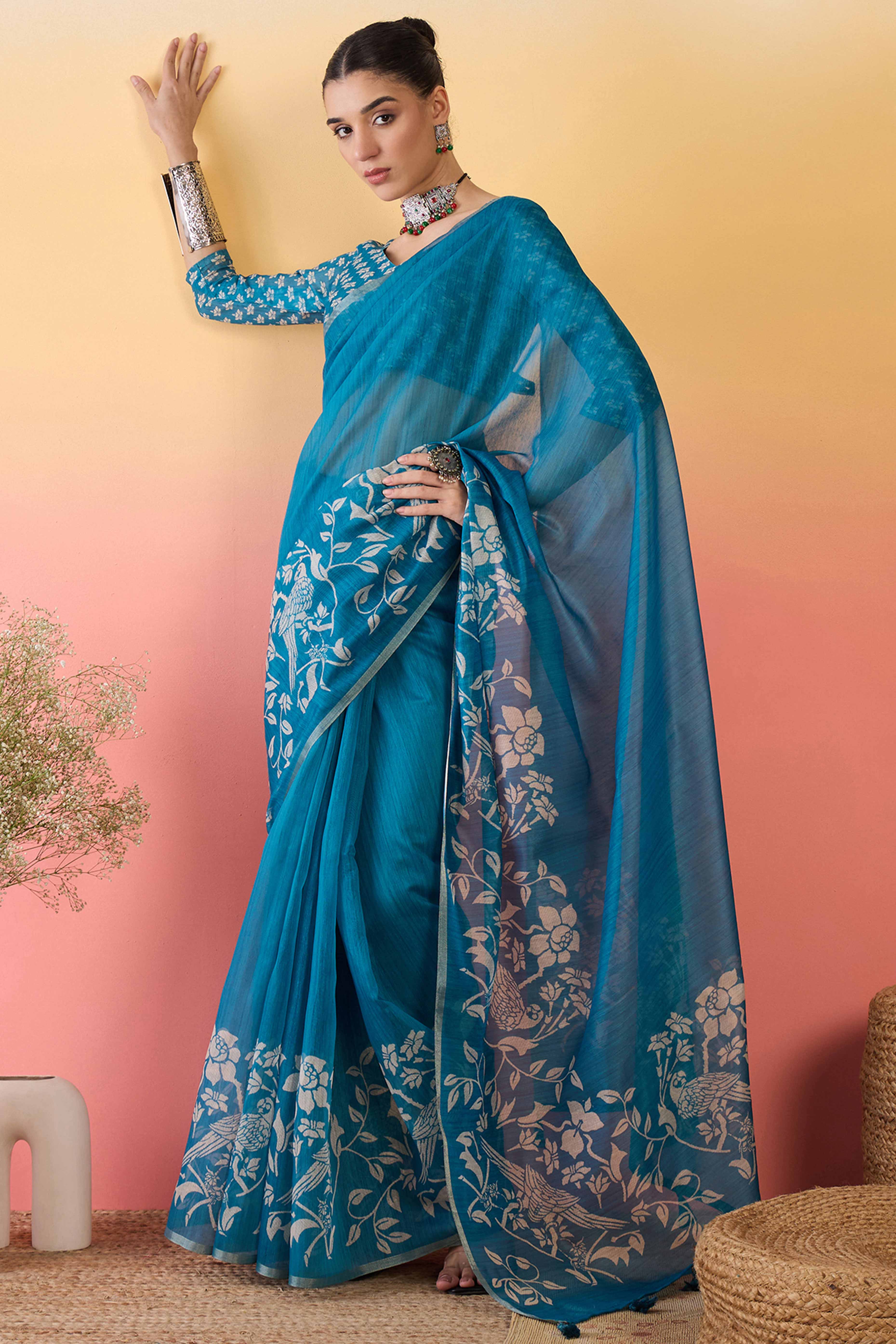 Blue Linen Cotton Saree Featuring Elegant Floral & Bird Prints With Tassel Pallu