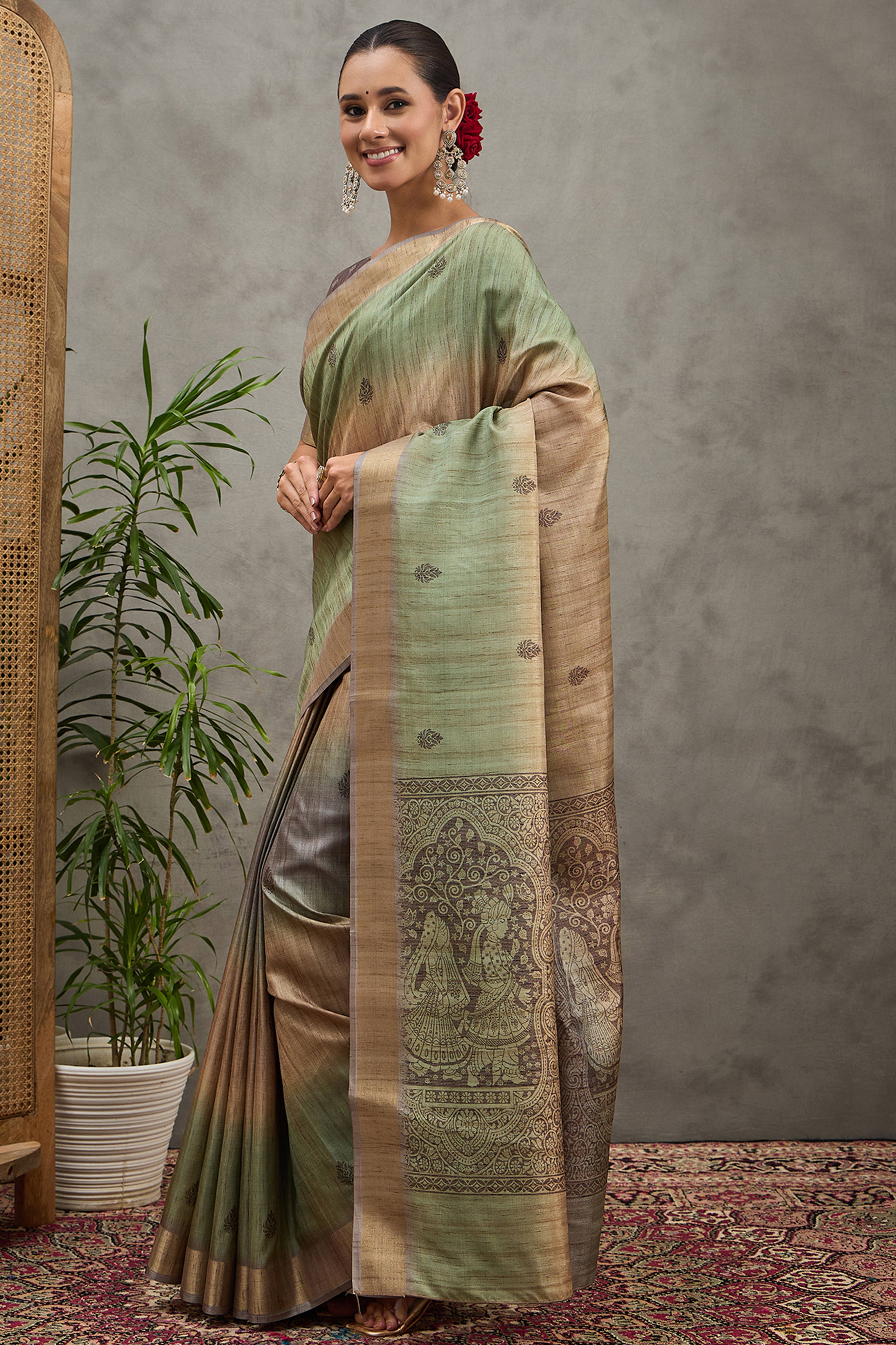 Pista Green Festive Wear Art Silk Saree Featuring Intricate Floral Weaving