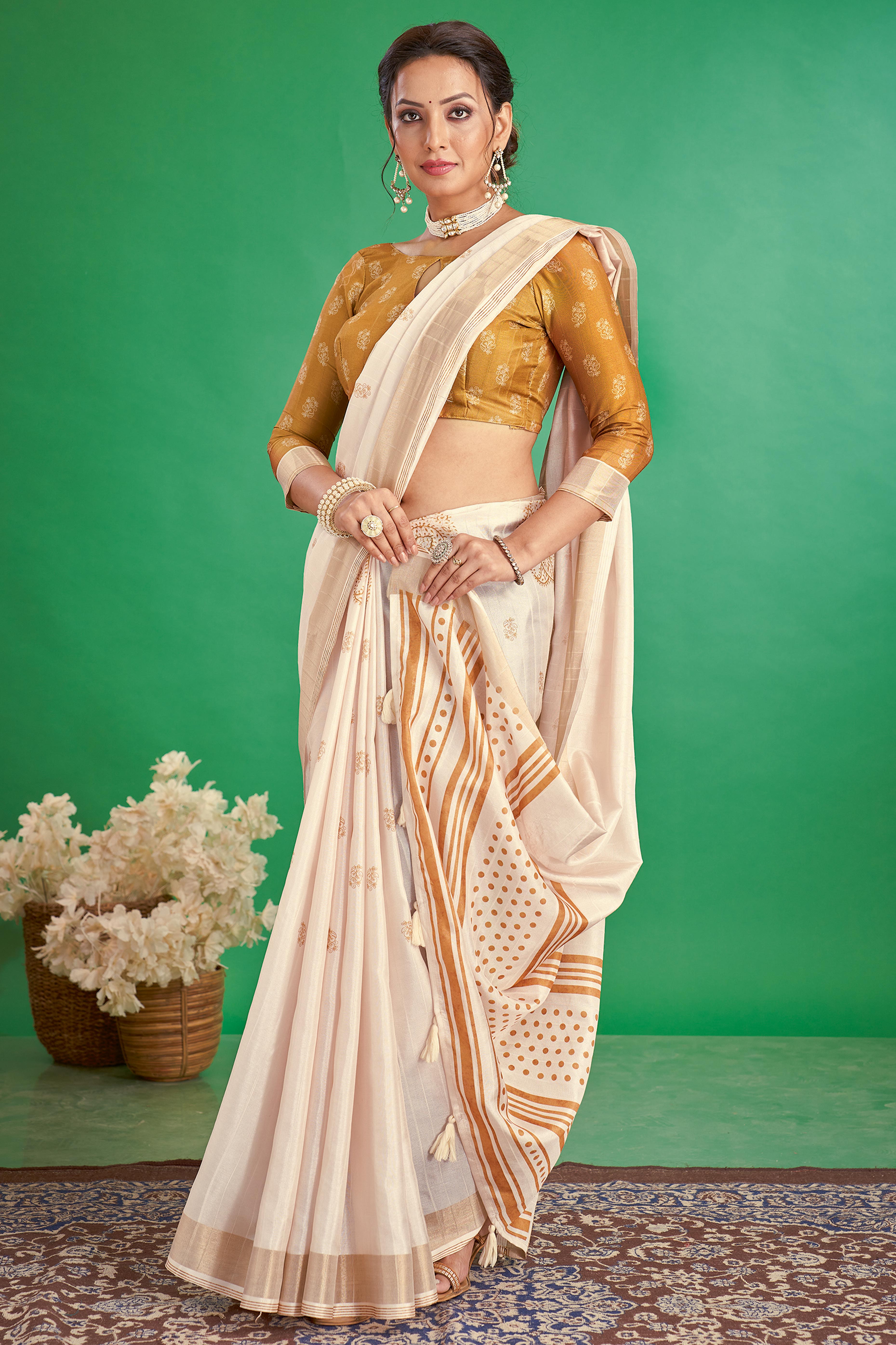 Charming Offwhite & Mustard Floral Printed Kotha Cotton Silk Saree Adorned With Tassel Pallu