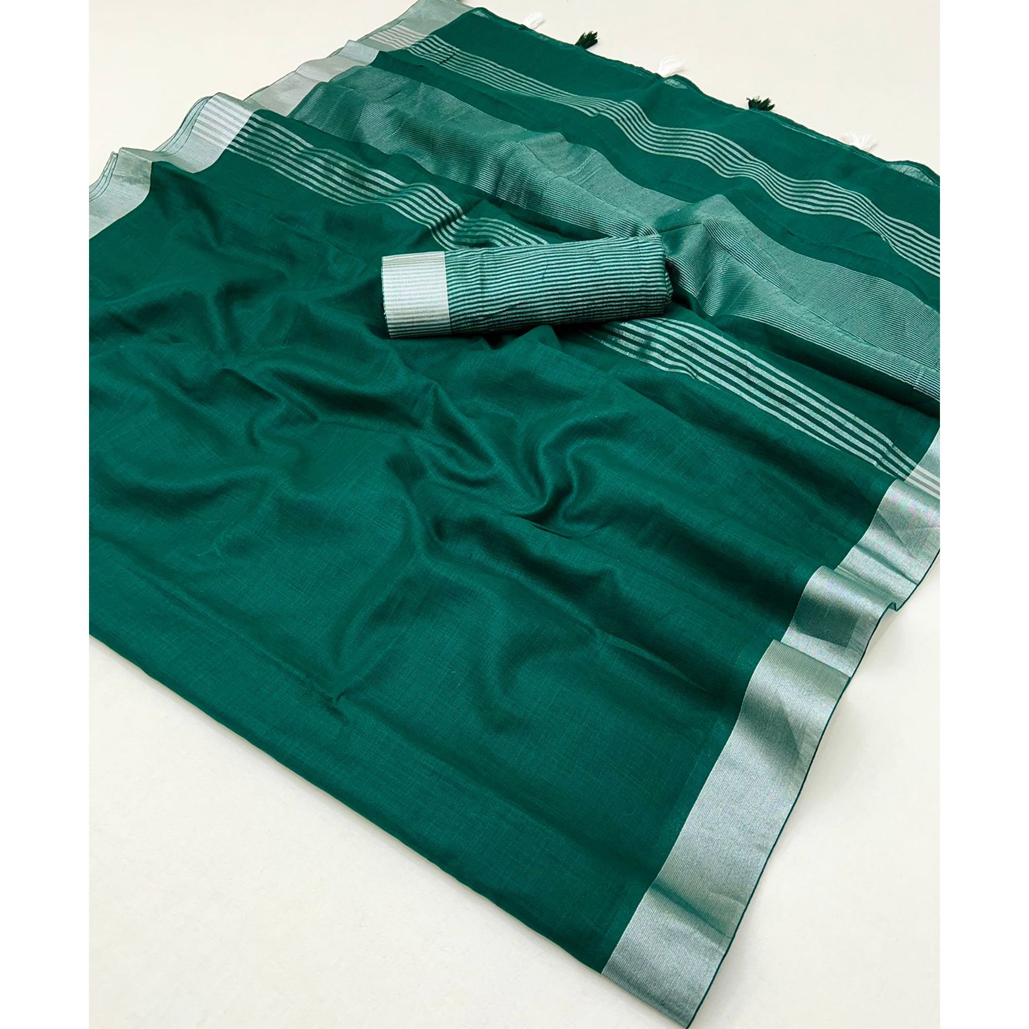 Green Solid Pure Linen Saree With Zari Woven Border