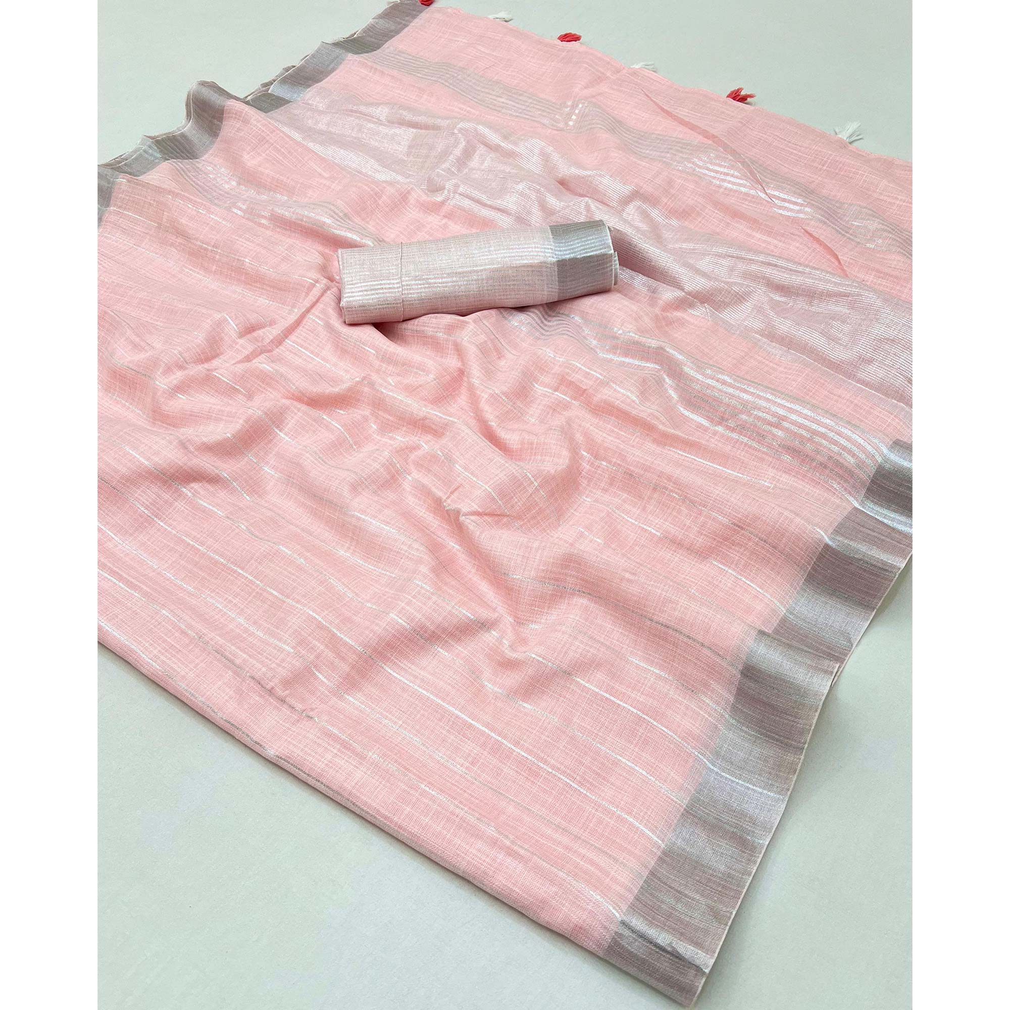 Light Pink Zari Woven Linen Saree With Tassels