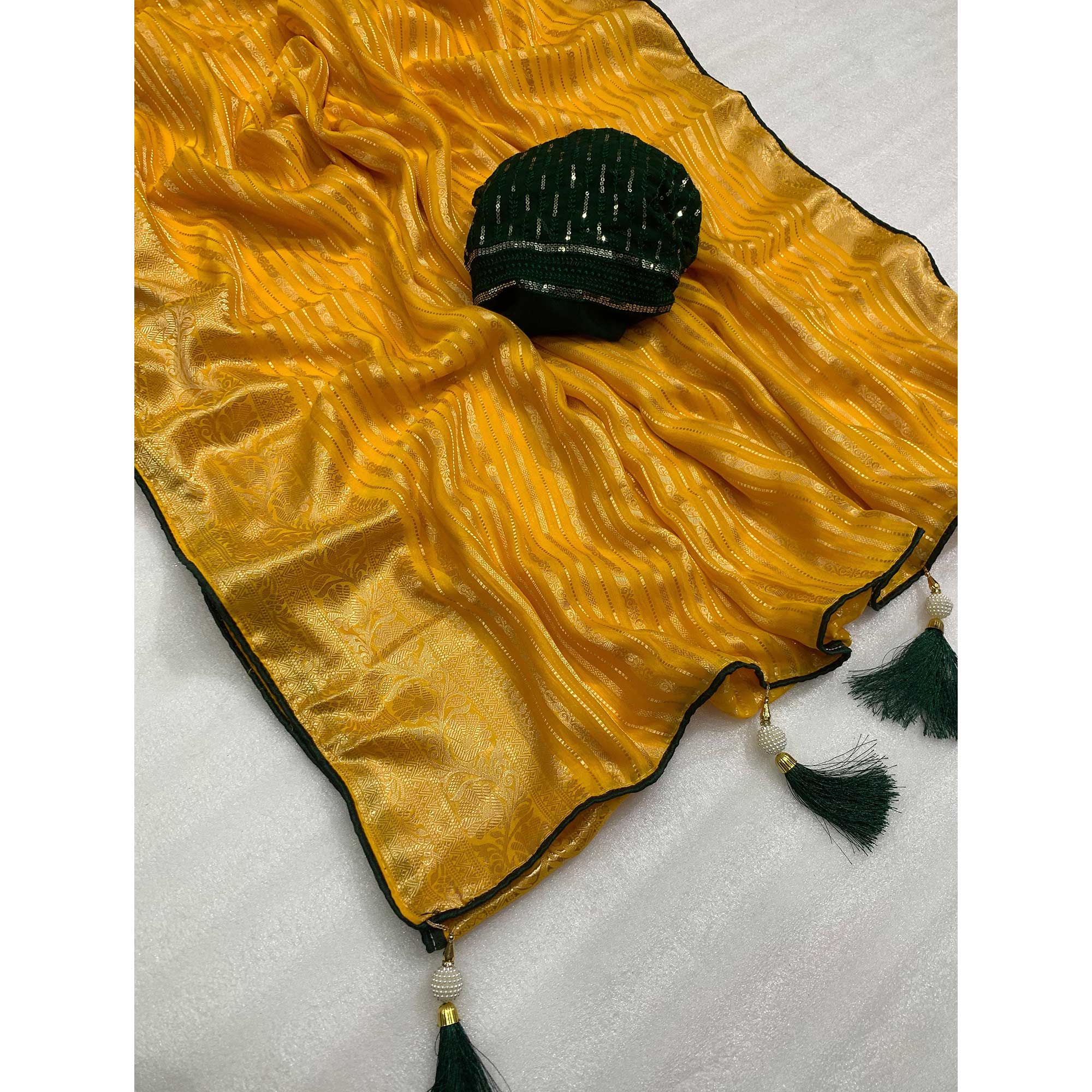 Yellow & Green Woven Georgette Saree With Tassels