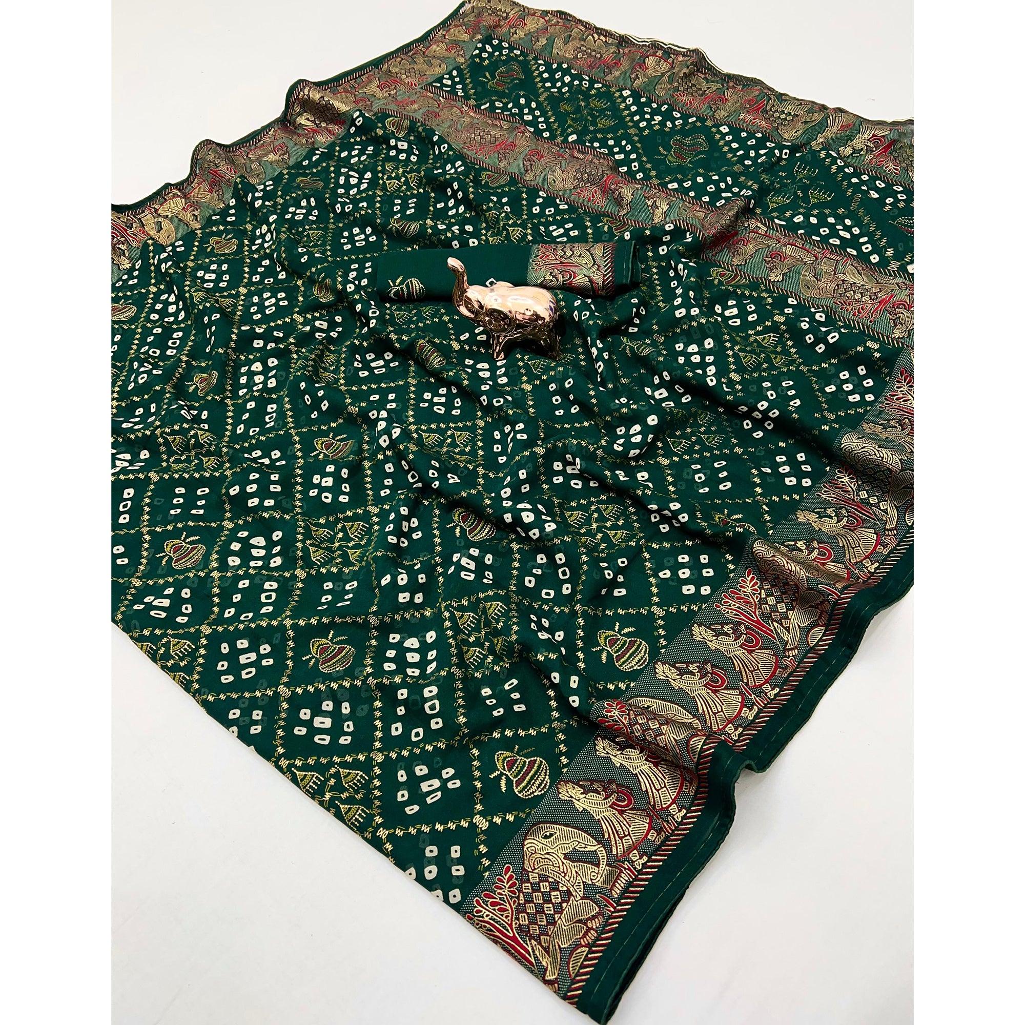 Elegant Bottle Green Bandhani Foil Printed Georgette Saree Highlighted With Soft Tassel Pallu