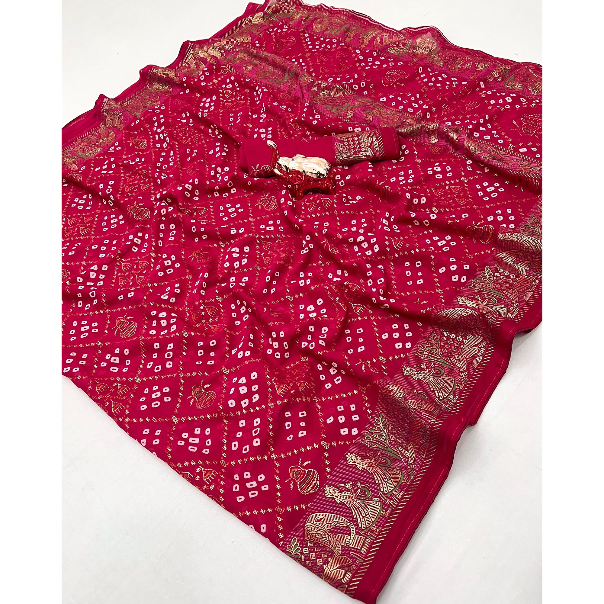 Elegant Pink Bandhani Foil Printed Georgette Saree Highlighted With Soft Tassel Pallu