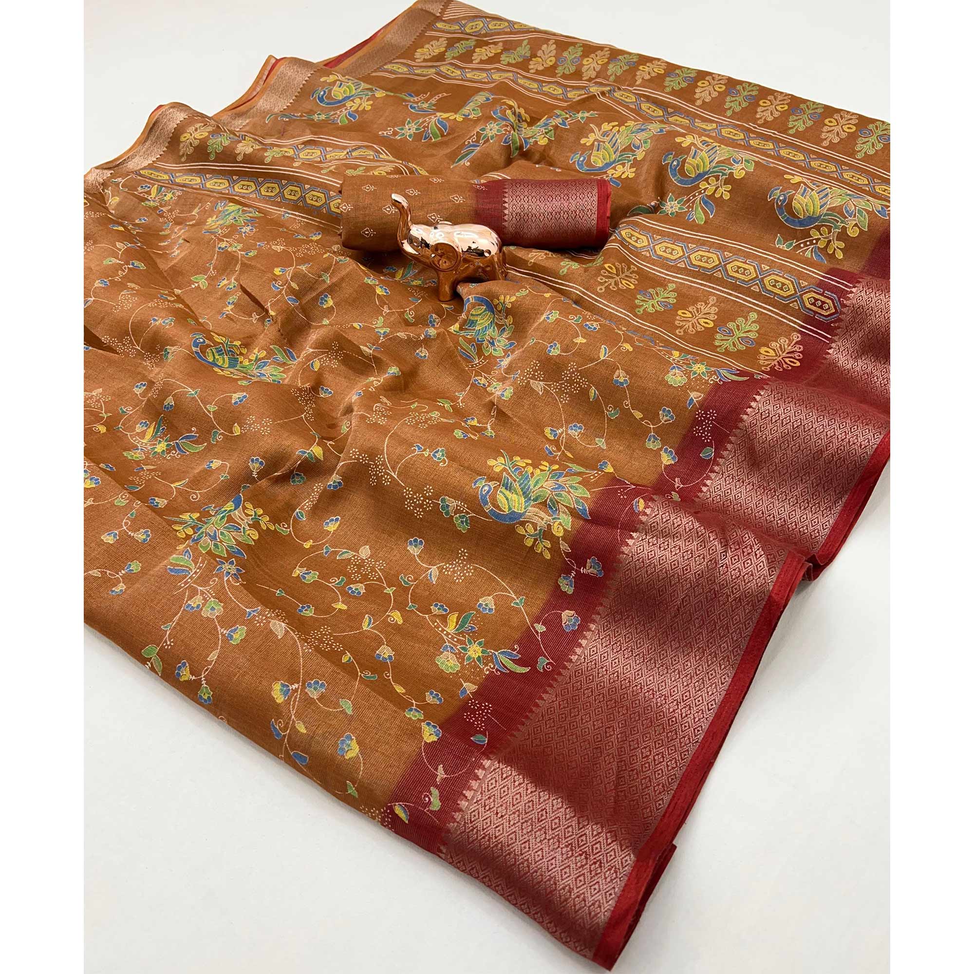 Rust Floral Printed Cotton Blend Saree With Zari Woven Border