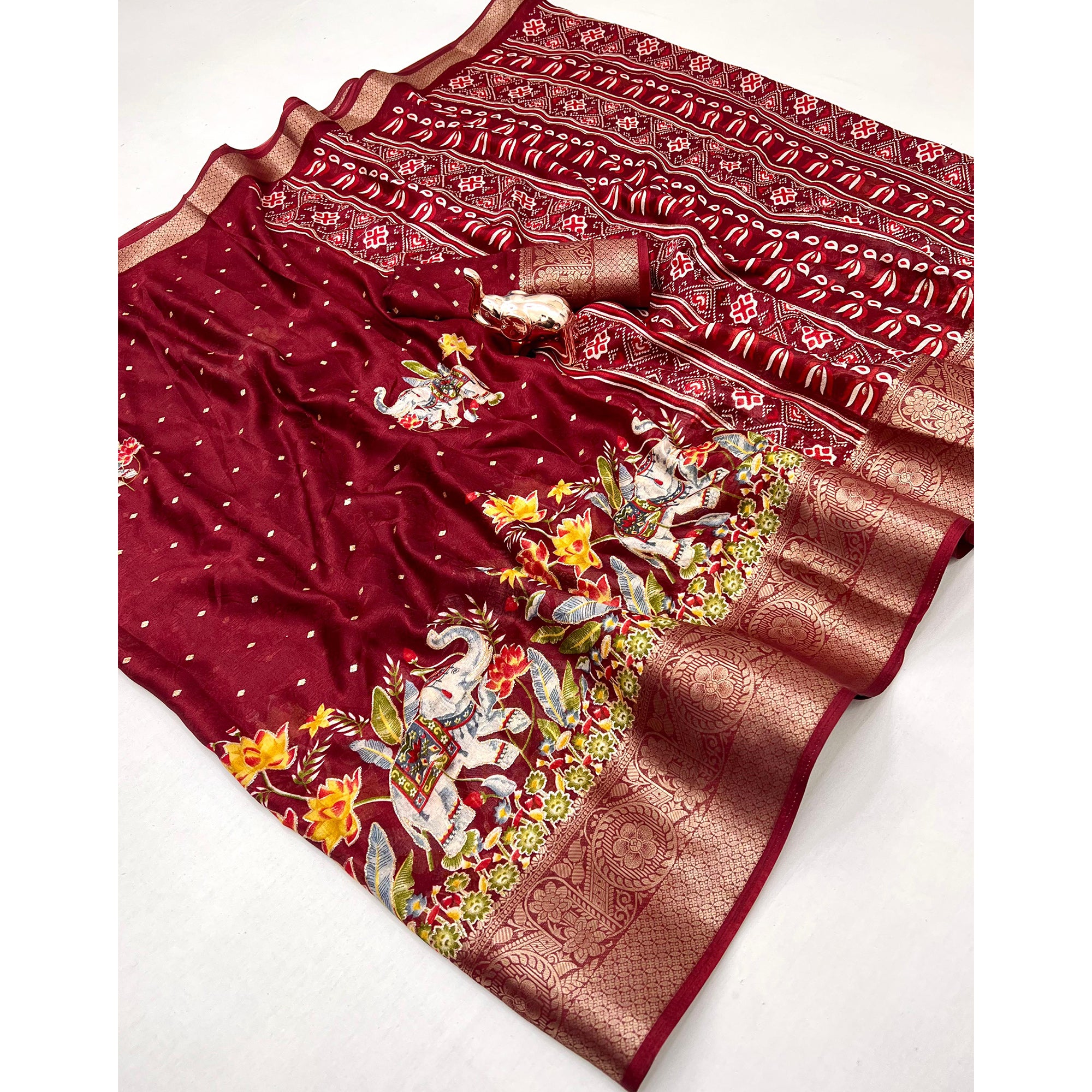 Elegant Maroon Elephant & Floral Printed Georgette Saree Accented With Gleaming Weaving Zari Border