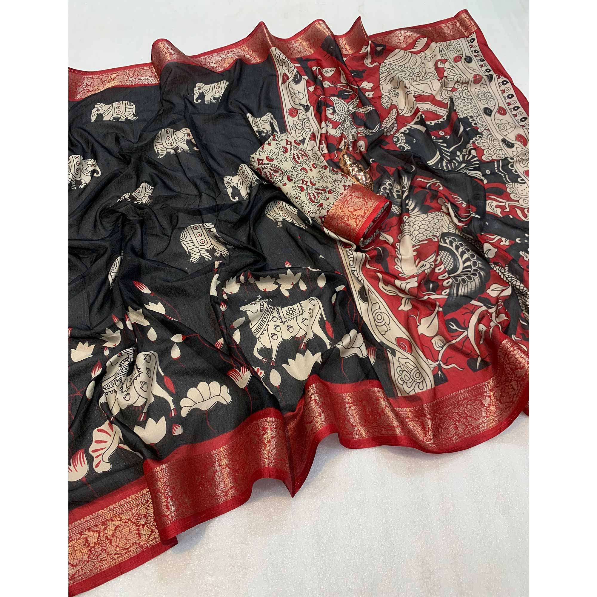 Heritage Inspired Black Mulmul Saree Featuring Pichwai Art Prints