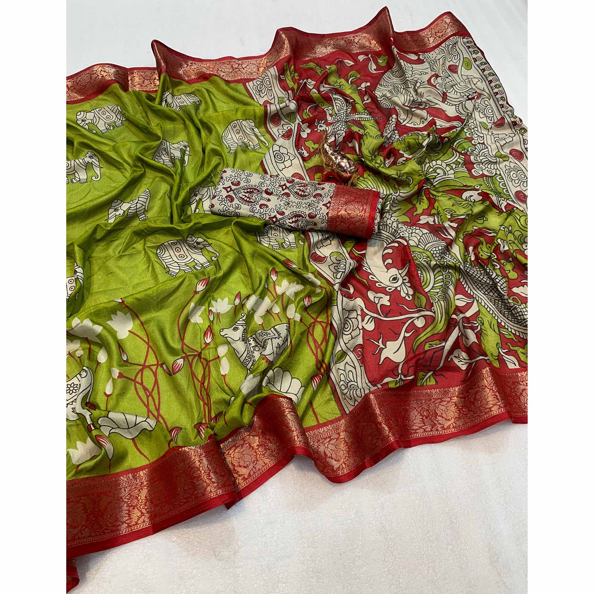Heritage Inspired Green Mulmul Saree Featuring Pichwai Art Prints