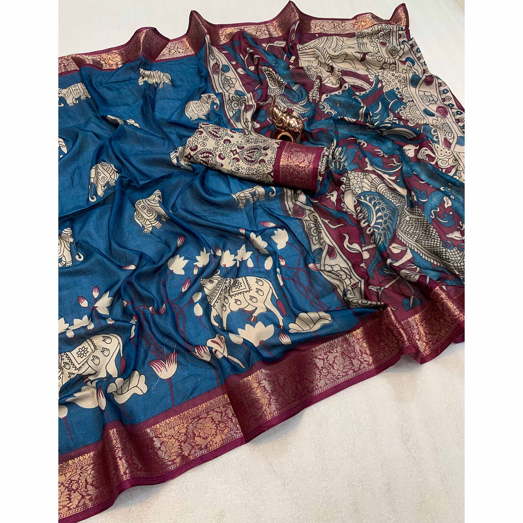 Heritage Inspired Teal Mulmul Saree Featuring Pichwai Art Prints