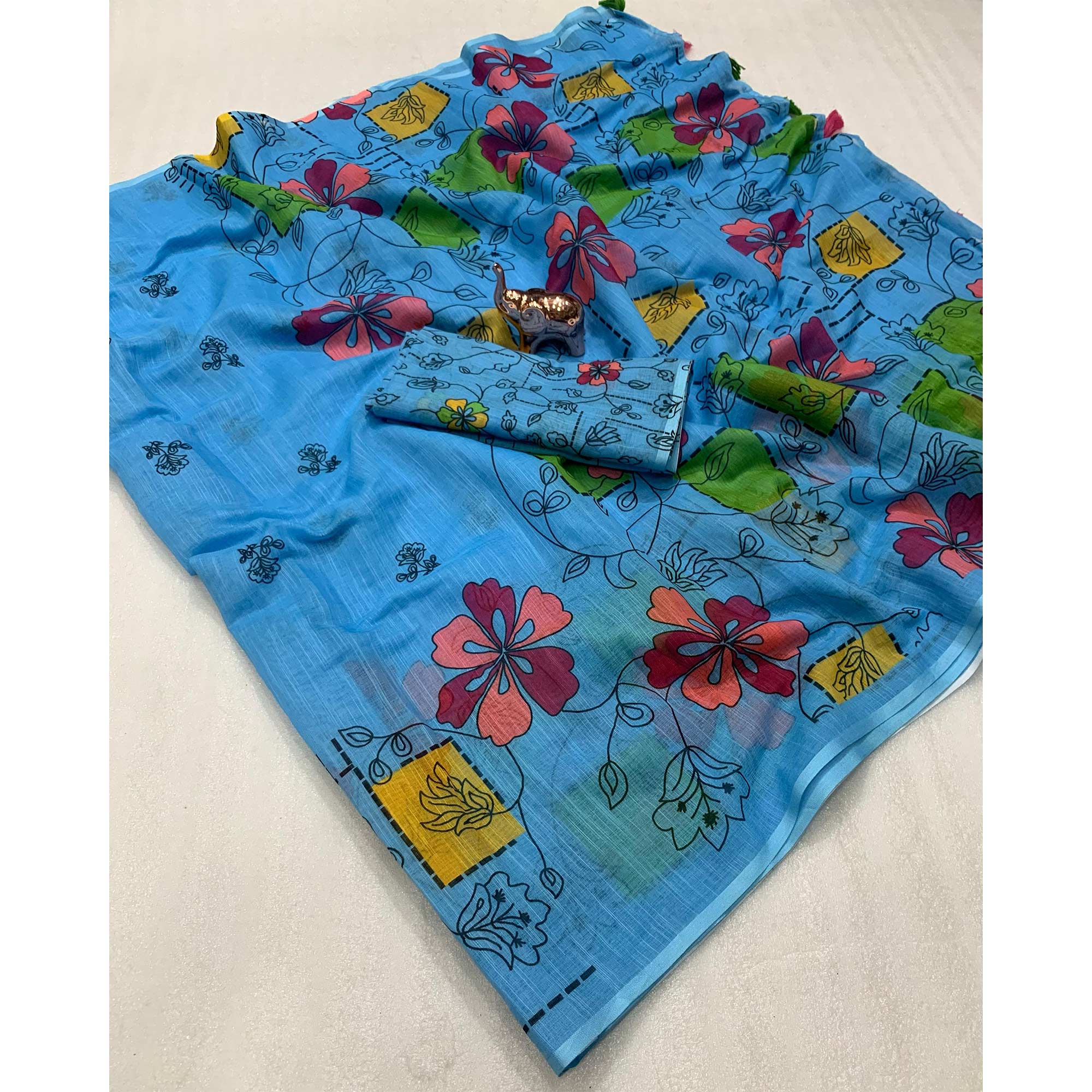 Sky Blue Floral Printed Linen Saree With Elegant Tassel Border